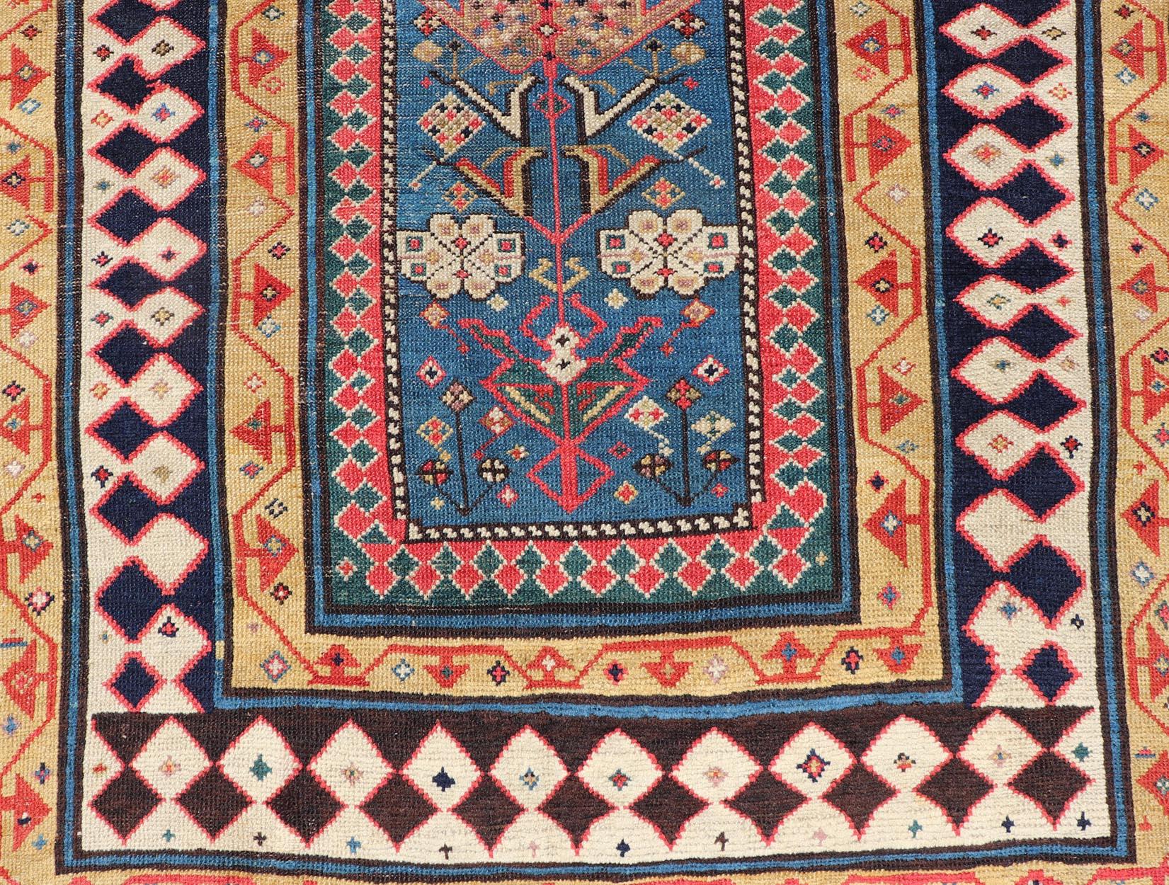 Wool Antique Caucasian Shirvan Rug with Tribal Design and Motifs in Vivid Colors For Sale