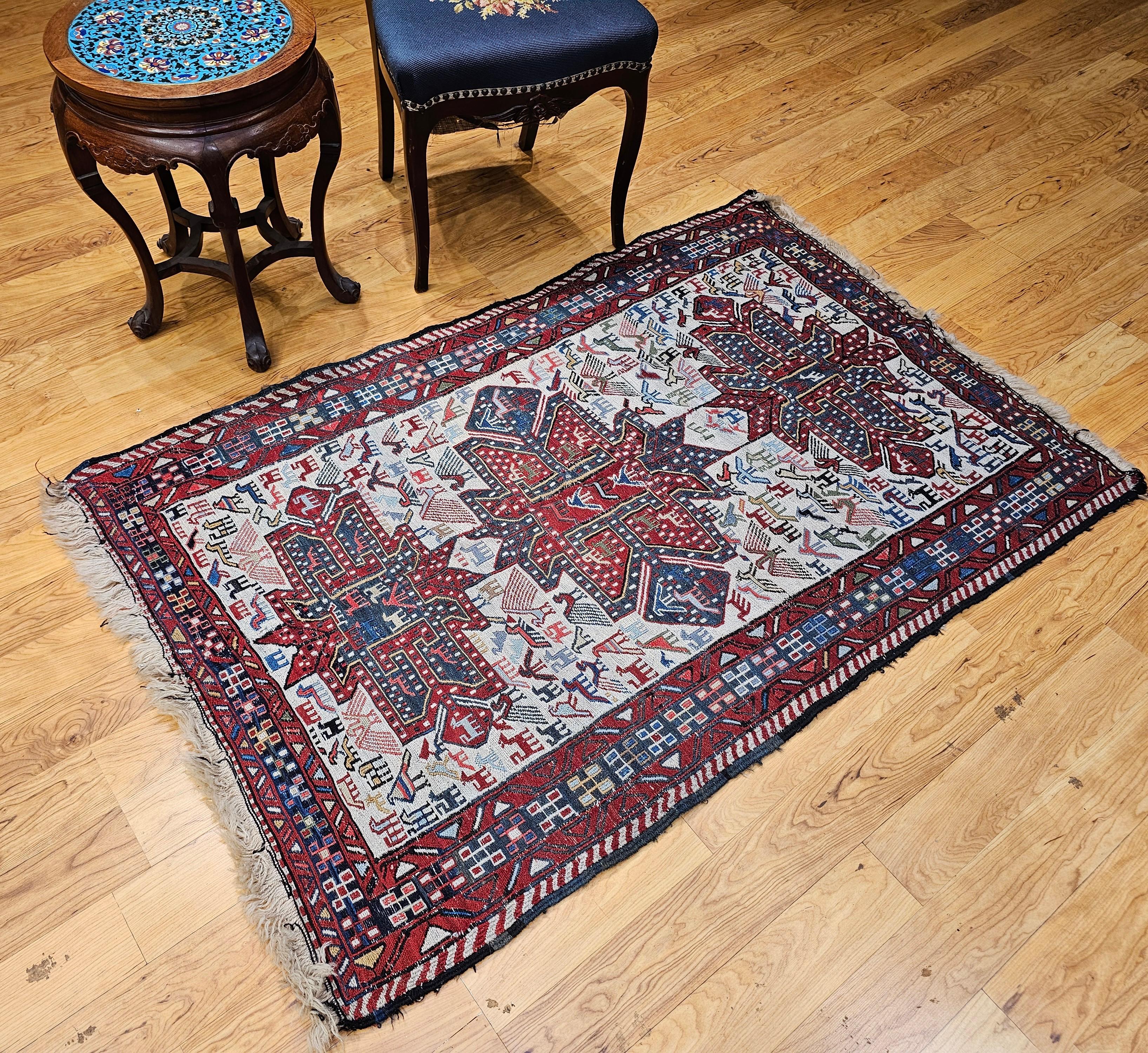 Antique Caucasian Soumak Area Rug with Bird Motifs in Ivory, Red & Blue For Sale 4