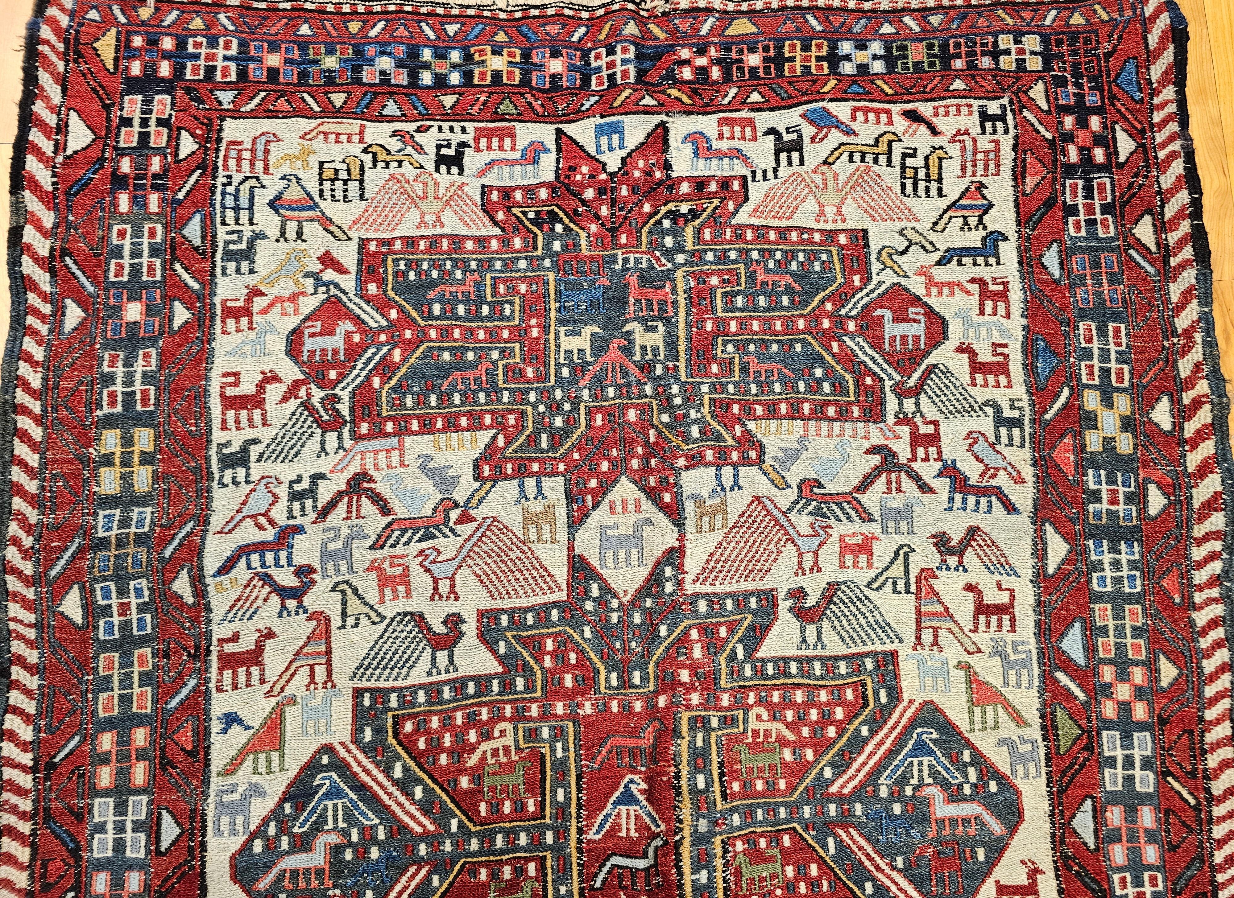 Vegetable Dyed Antique Caucasian Soumak Area Rug with Bird Motifs in Ivory, Red & Blue For Sale