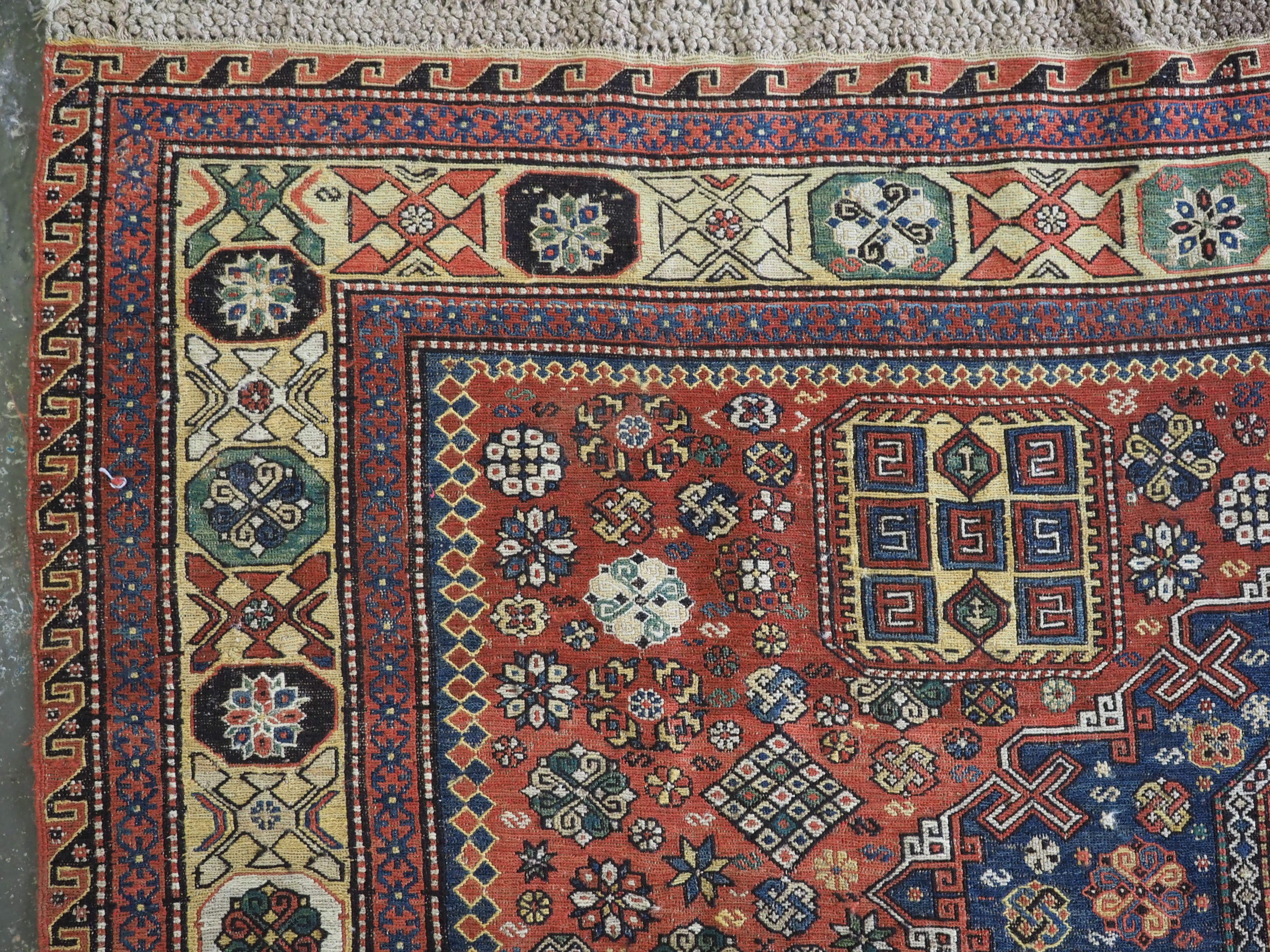 Wool Antique Caucasian soumak carpet of three medallion design, 1870 or earlier For Sale