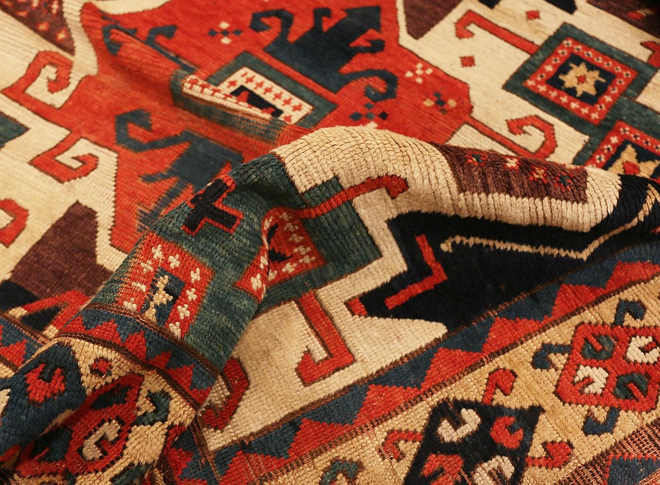 Wool Rare Antique Caucasian Star Kazak Rug. Size: 4 ft 10 in x 7 ft (1.47 m x 2.13 m)