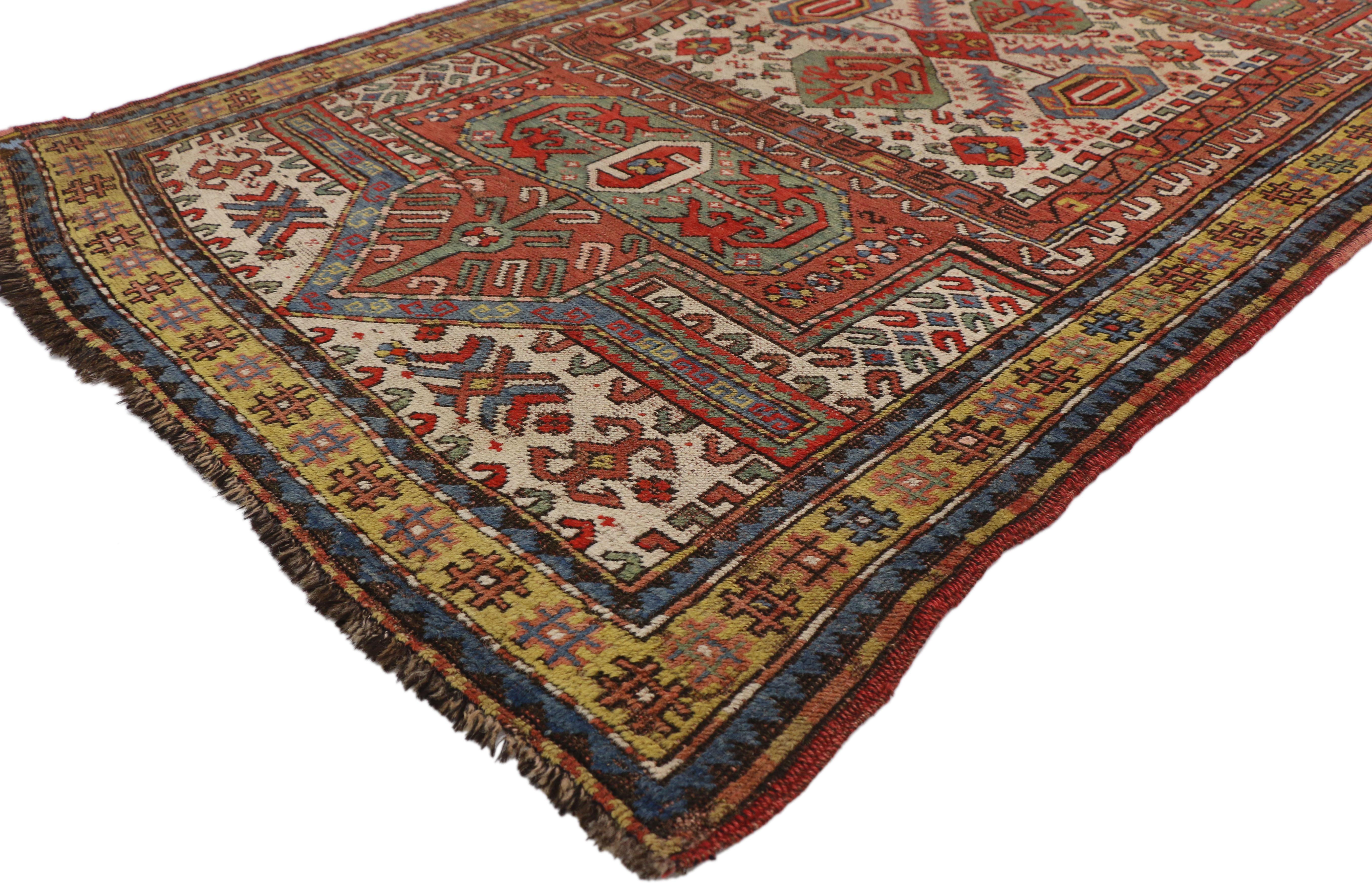 74400, antique Russian tribal Kazak Prayer rug with compartment design Caucasian rug. With its traditional and ancient tribal designs, this antique Caucasian Kazak prayer rug takes on a curated look that feels timeless yet classic. It features a