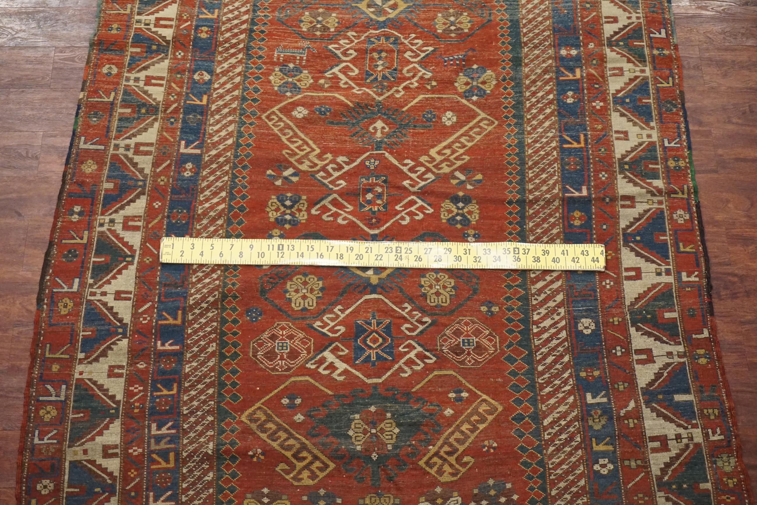 Wool Antique Caucasus Kazak Rug, circa 1900 For Sale
