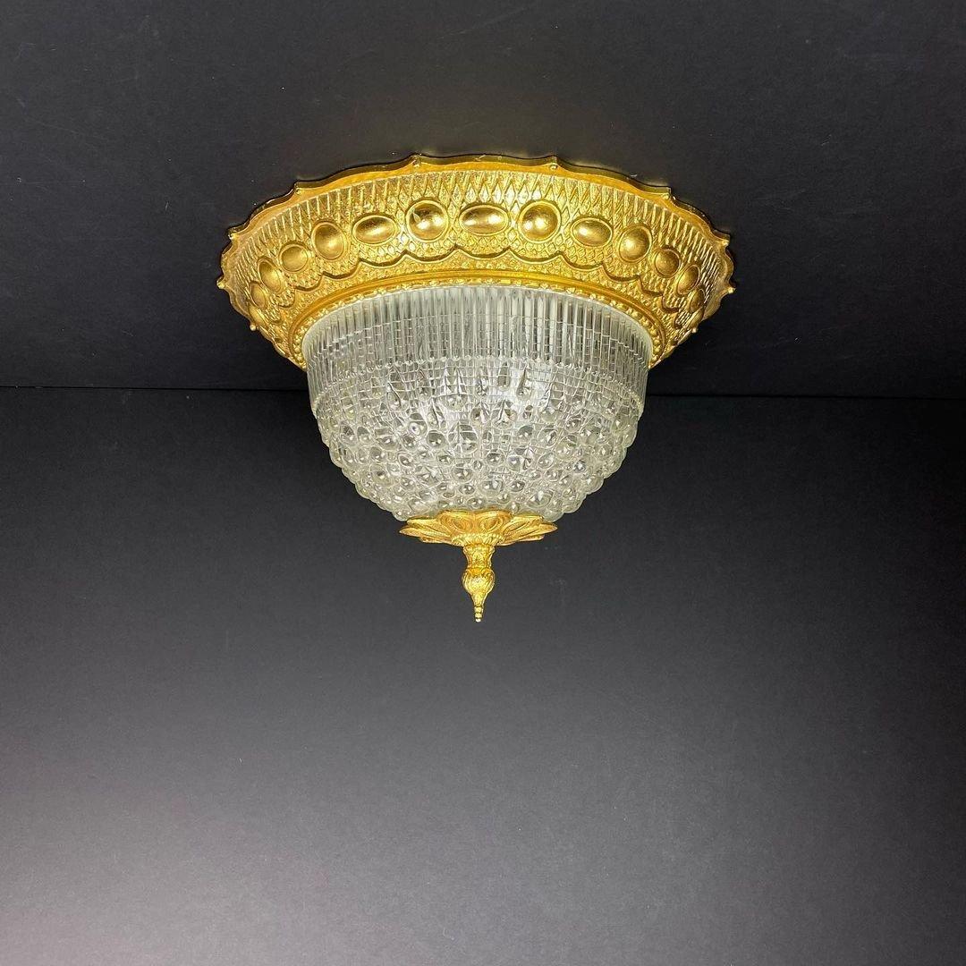 Fine Antique French Gilt Bronze and Cut Crystal Flush Mount.
A fine and unique antique French gilt bronze and cut crystal ceiling fixture.

Pineapple Flush-Mount Ceiling.

Since Colonial times, the pineapple has symbolized southern hospitality. The