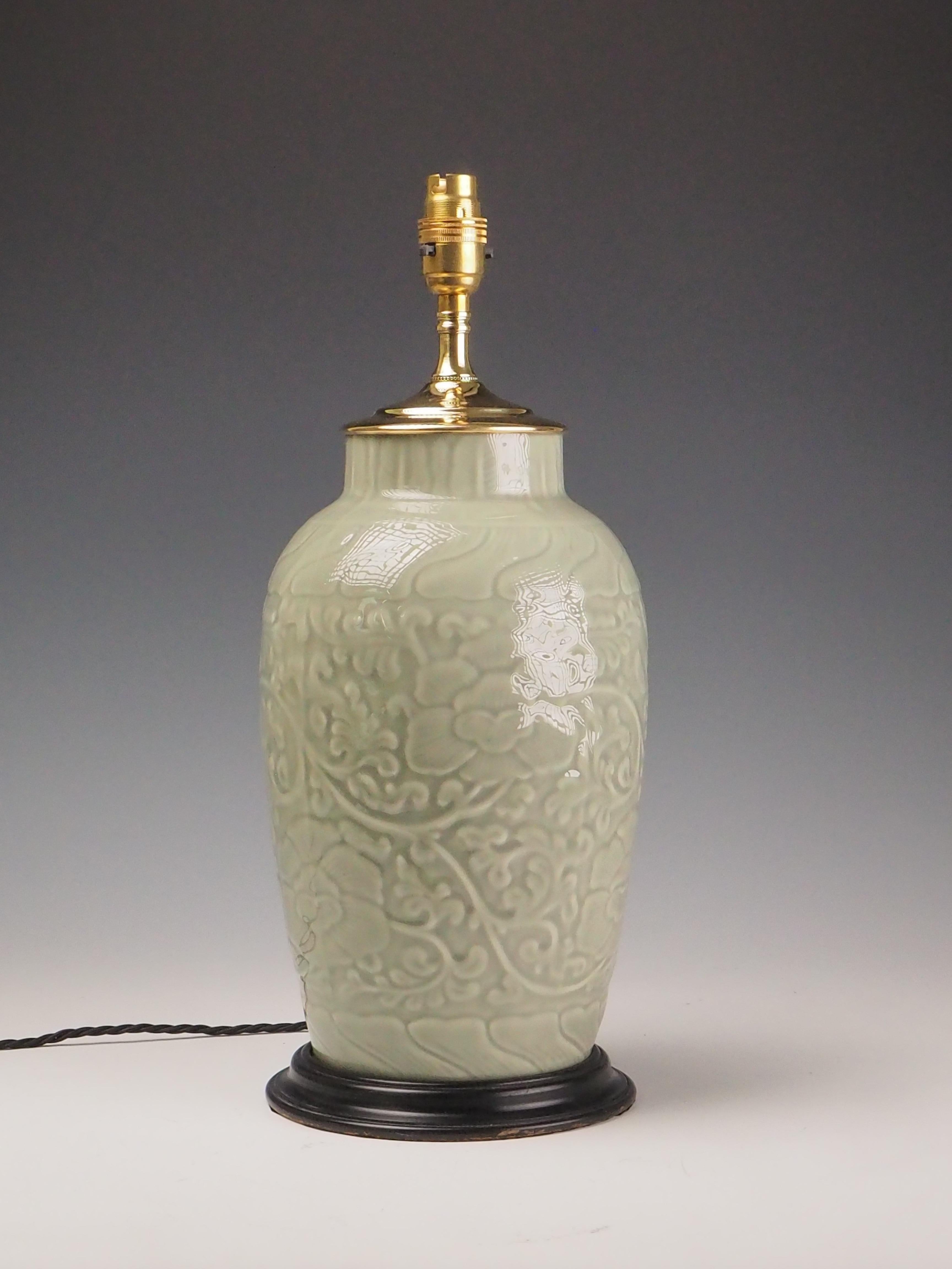 Antique Celadon Porcelain Table Lamp

Graceful Antique Celadon Porcelain Table Lamp featuring a sleek ebony base. A timeless piece of decor that blends sophistication with historic craftsmanship.

Celadon lamps are crafted from celadon porcelain, a