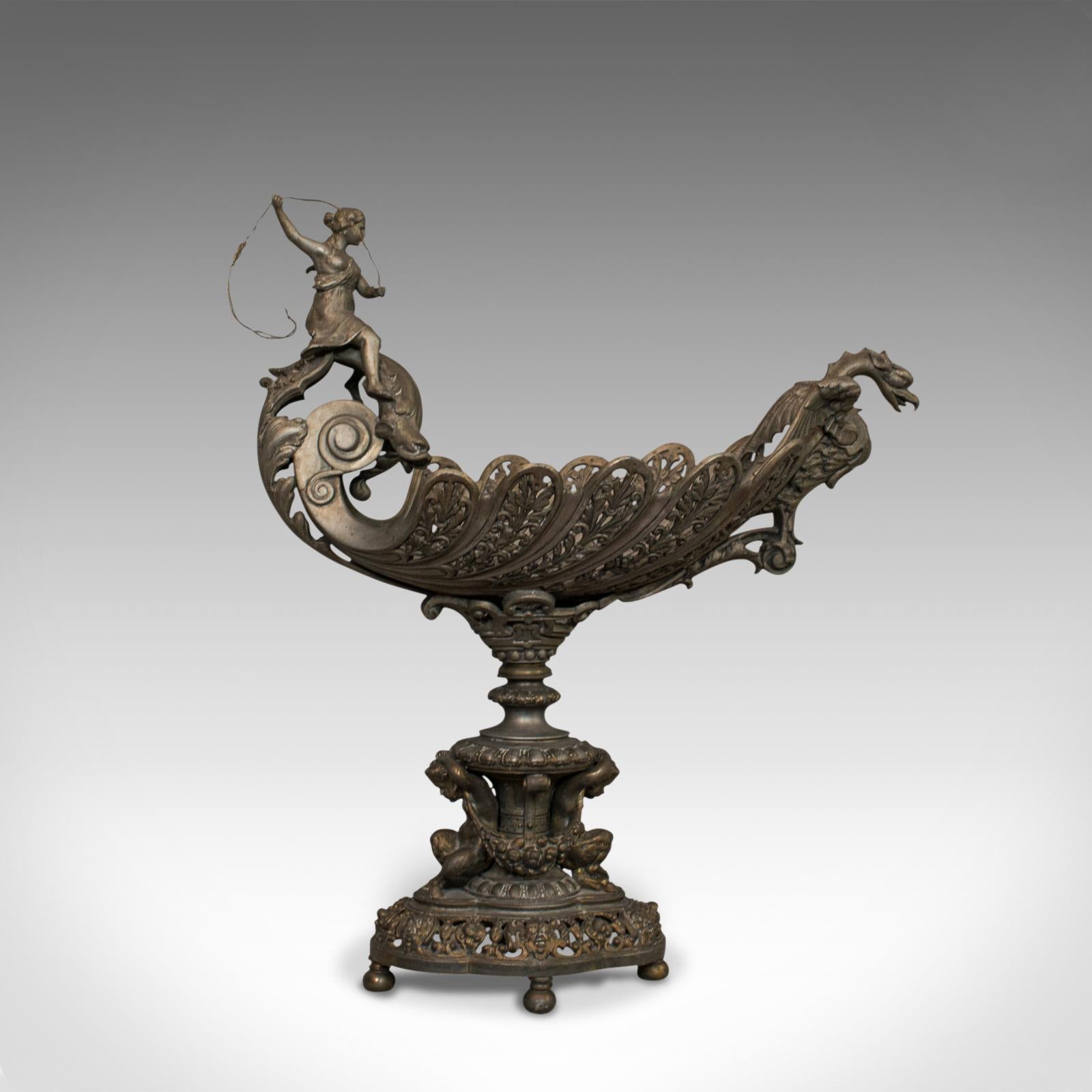 This is an antique centrepiece in classical taste. A French, bronze spelter fruit or serving bowl and dating to the Victorian period of the late 19th century, circa 1890.

Of highly impressive classical form - a conversation starter