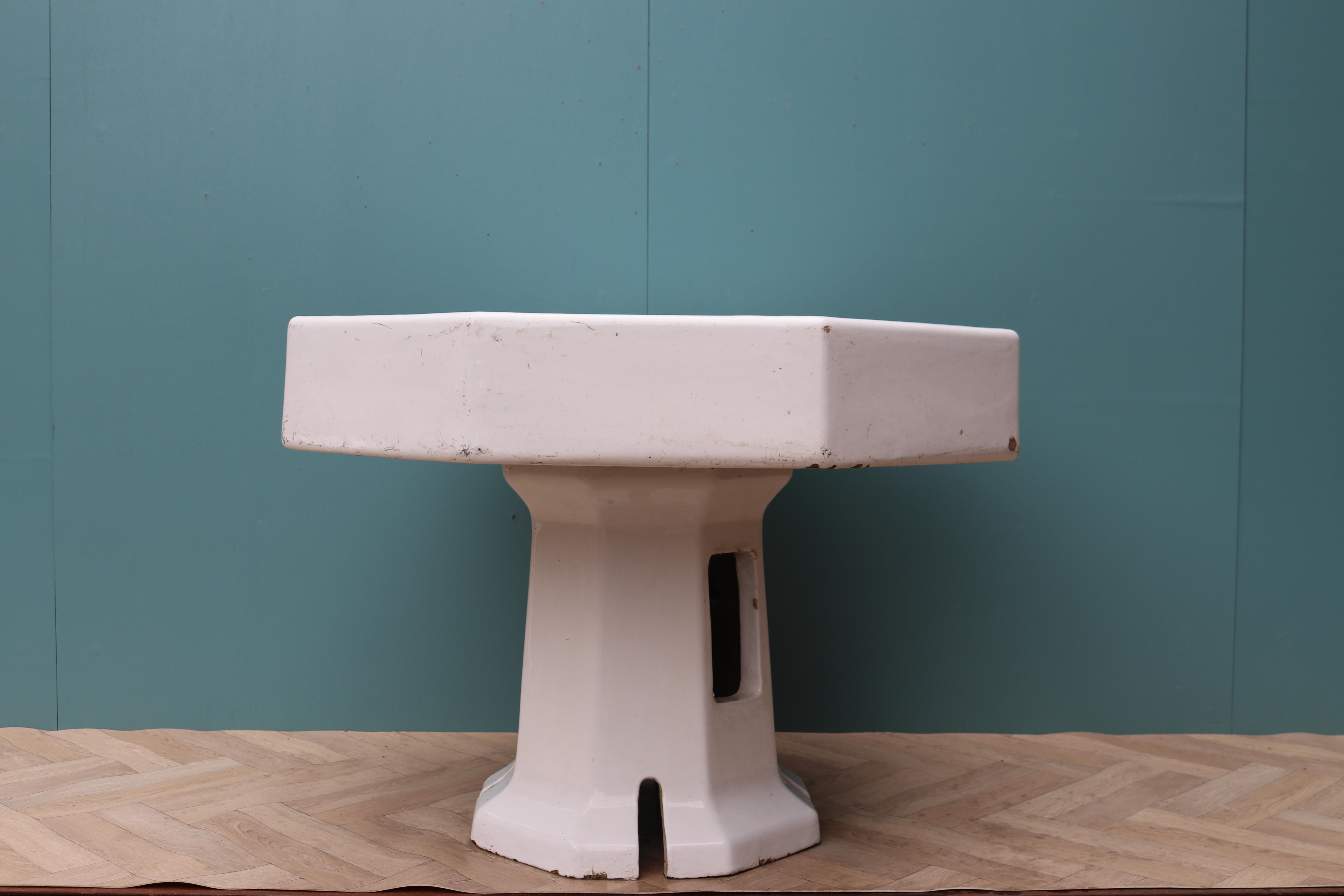 A white glazed ceramic bowl on pedestal. Originally a wash basin, this durable piece can be repurposed as a garden fountain.
 
Additional Dimensions
 
Depth of bowl 12 cm
 
Base 56 cm square
 
Waste Diameter 10 cm
