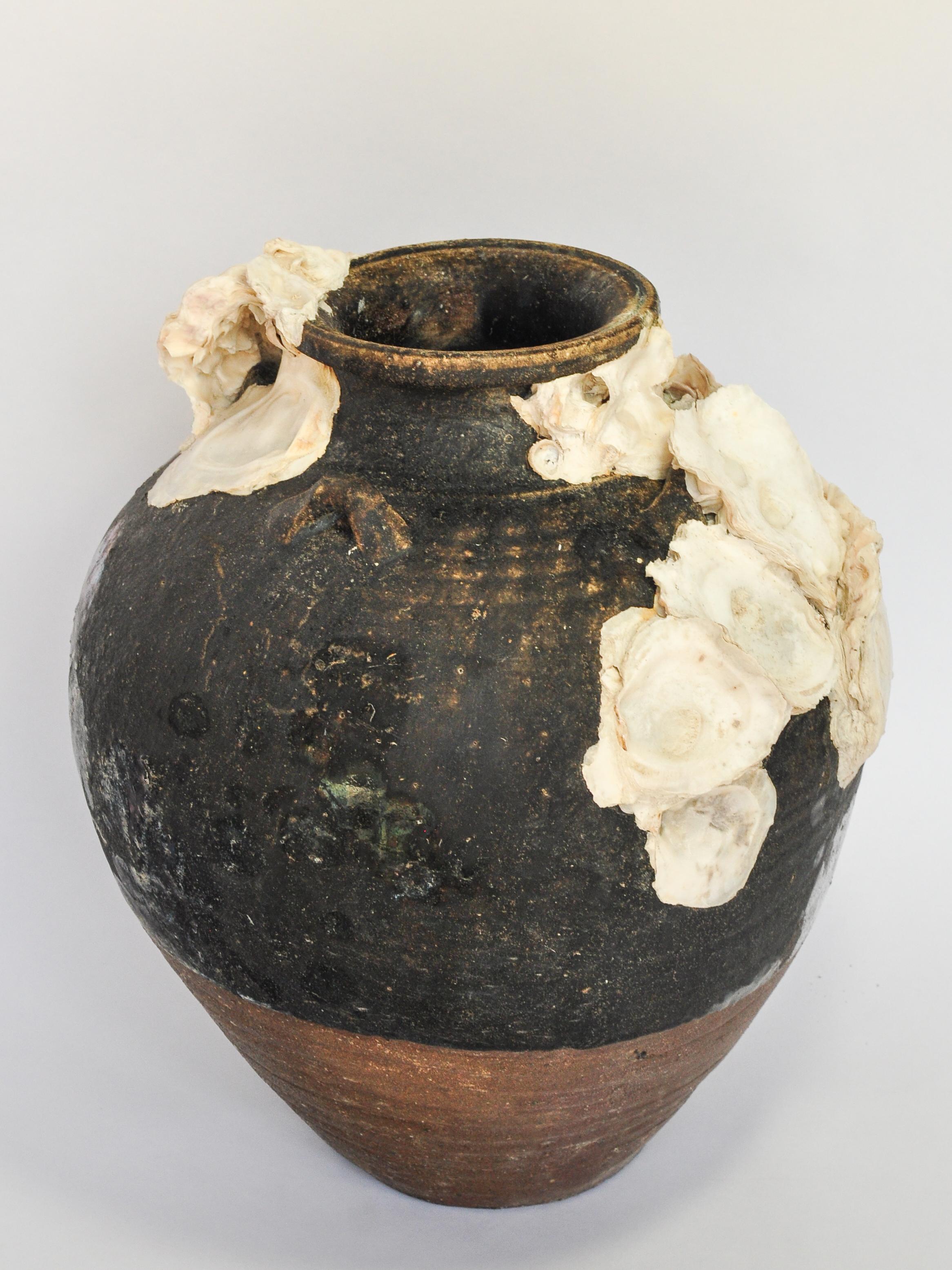 Large Antique ceramic jar with encrustations Sawankhalok Thailand 14th to 15th Century. 15