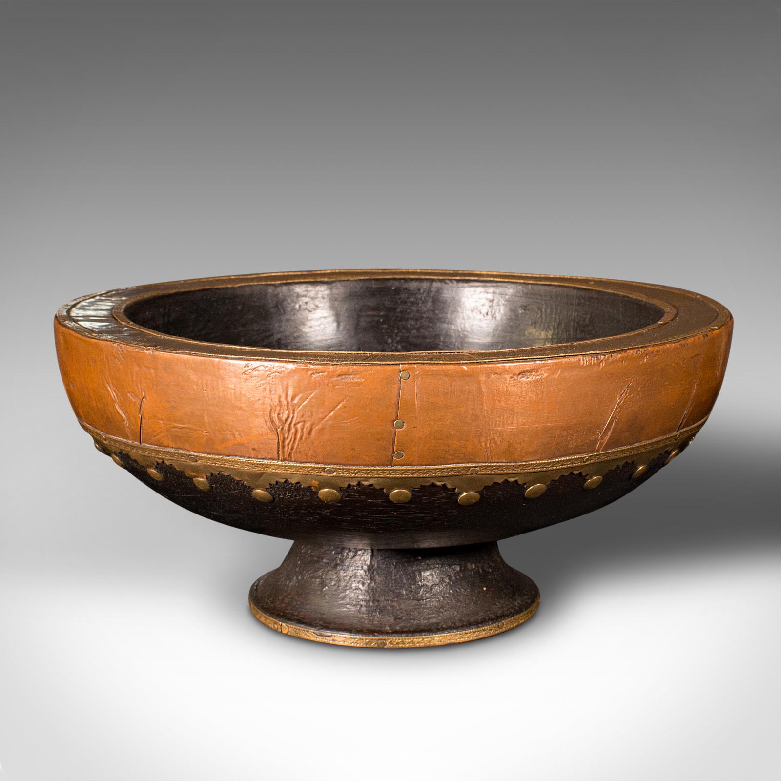 This is an antique ceremonial collection bowl. An Indian, ebonised dish with brass and copper decor, dating to the late Victorian period, circa 1900.

Fascinating decoration and tonality to this appealing bowl
Displays a desirable aged patina and