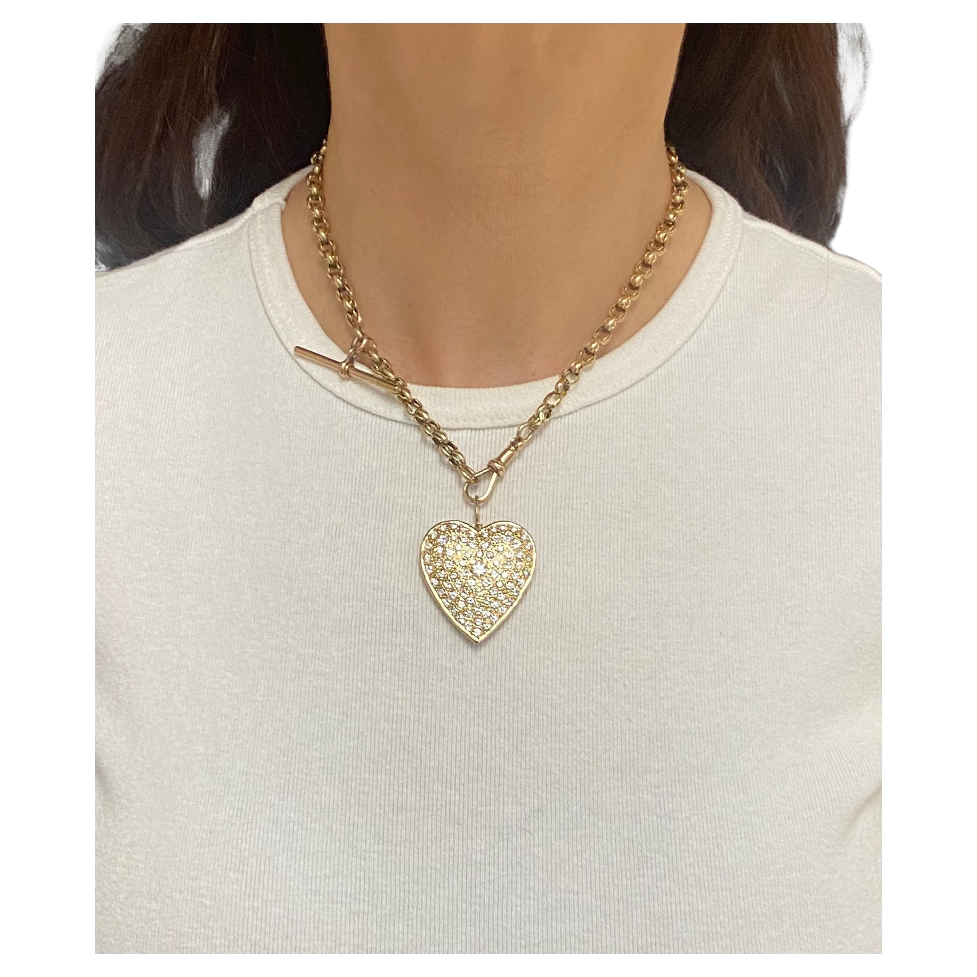 
Materials: 9K Yellow Gold Chain, 14K Gold Pendant
Weight: Chain - 22.3 grams; Pendant - 13.9 grams
Gemstone: Round Brilliant  Cut Diamond 
Measurement: Pendant - 1 5/16