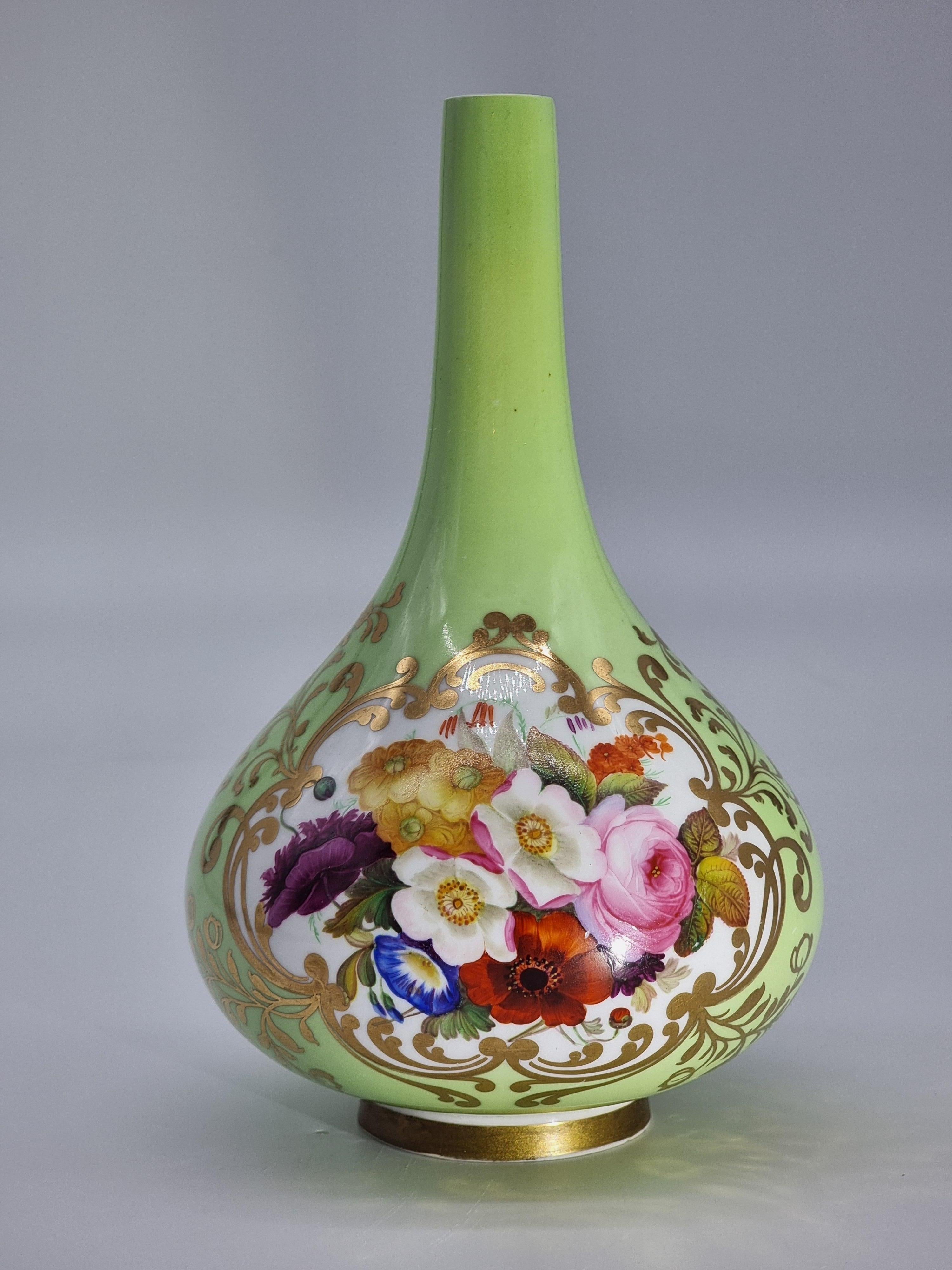 This very pleasing early porcelain early English porcelain vase was made at the Chamberlain and Co. Factory in Worcester which had London showrooms at 155 New Bond Street and Coventry Street, London.

This elegant vase dates to circa 1830. It is