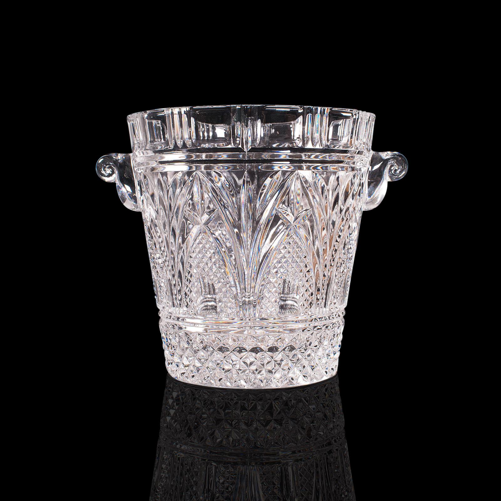 This is an antique champagne cooler. An English, cut glass wine bottle or drinks ice bucket, dating to the Edwardian period, circa 1910.

Superb cut glass cooler of generous proportion
Displays a desirable aged patina and free of