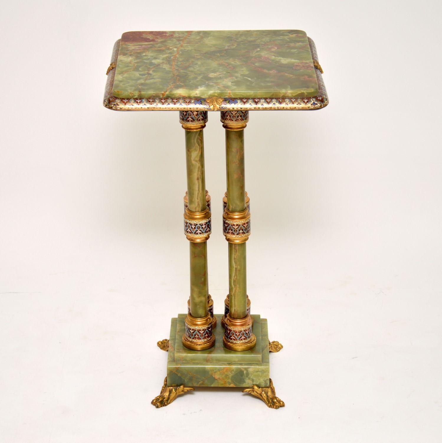 This antique French champlevé enamel cloisonné onyx and gilt bronze table stand is an absolutely stunning and rare item. Please enlarge all the images to appreciate all the work involved, especially within the colourful details. It’s in excellent