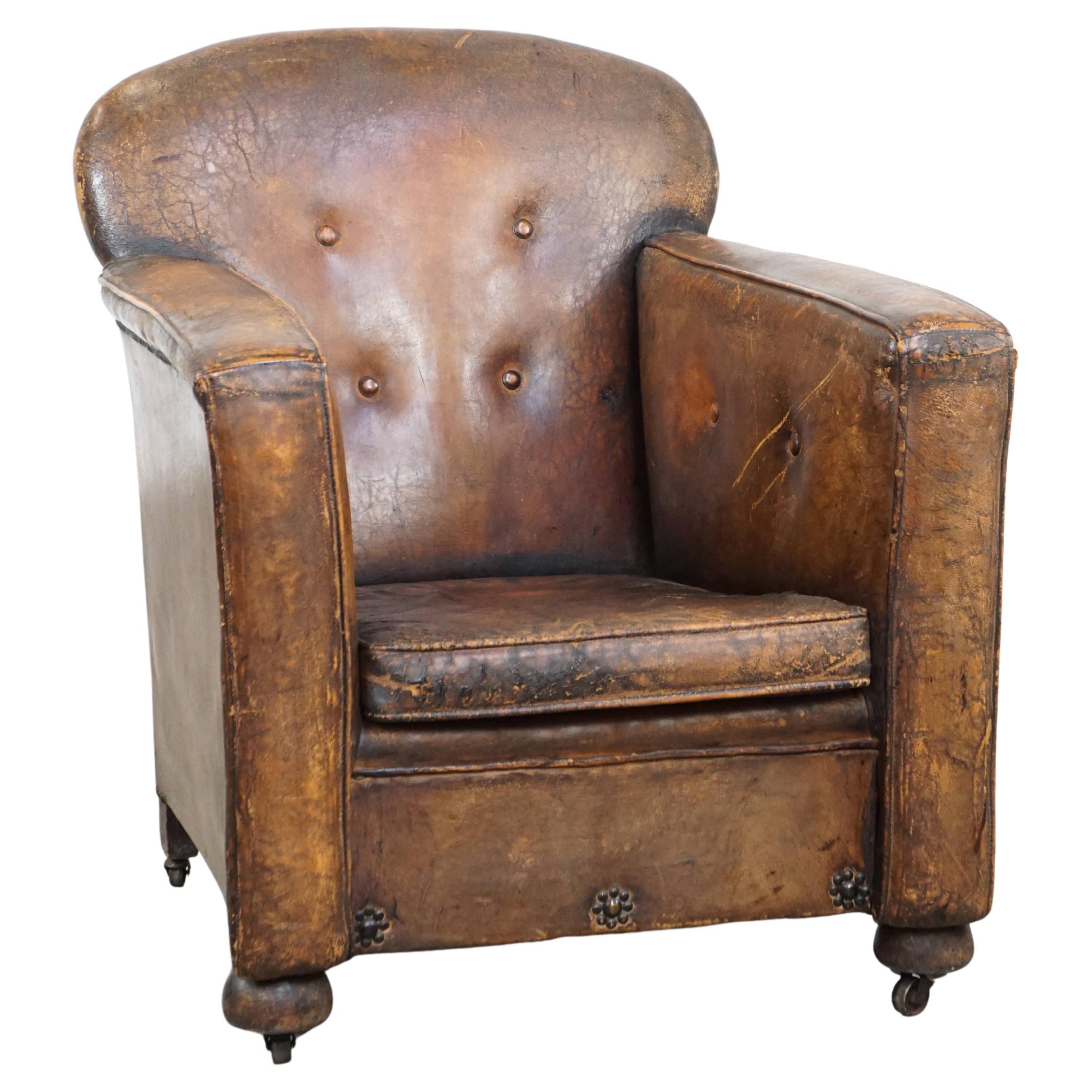 Antique, characteristic, and charming sheepskin leather armchair on wheels