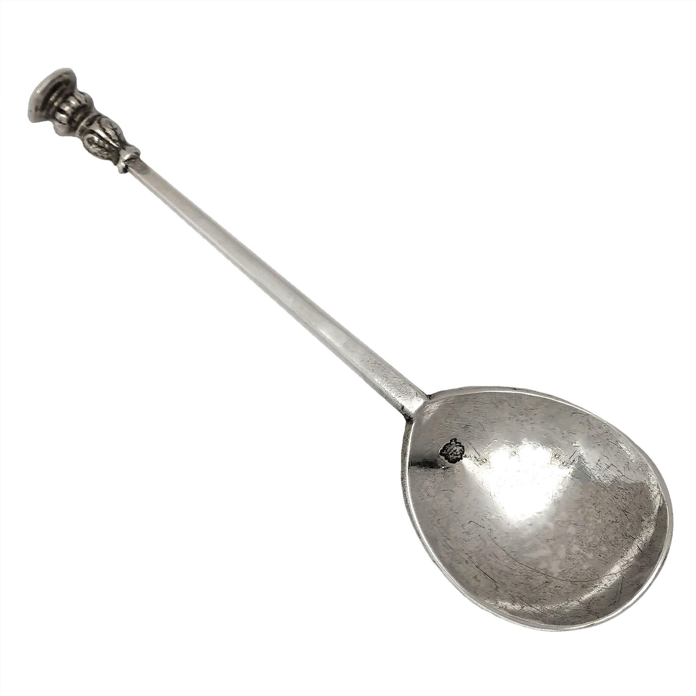 A traditional Antique Charles I Silver Seal Top Spoon with a fig shaped bowl and a subtly hexagonal handled ending in a knopped Seal. The Seal is engraved with the initials EB.

Made in London, UK in 1642 by IF

Approx. Weight - 60g
Approx. Length -