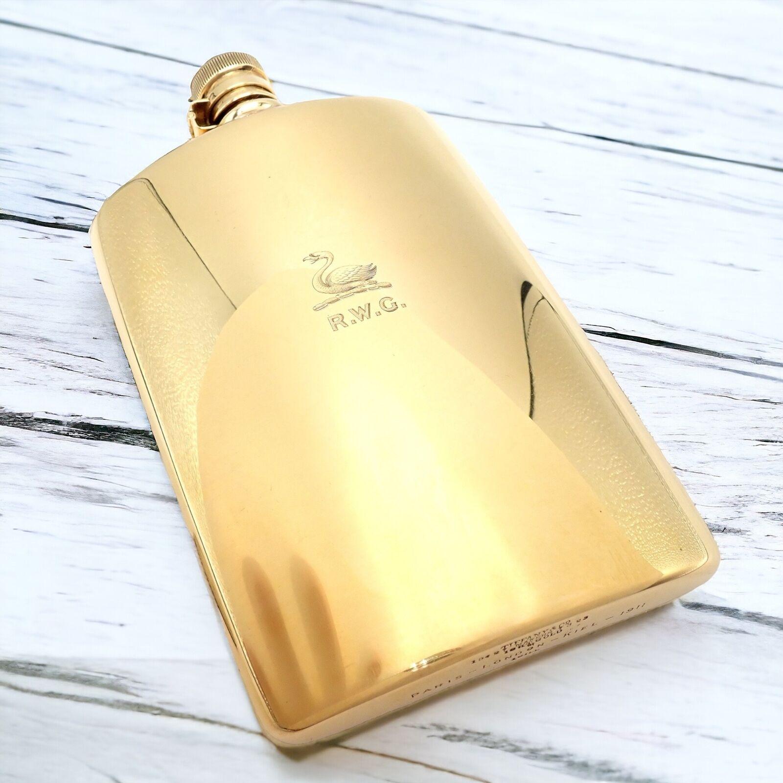18k Solid Yellow Gold Antique Bottle Flask by Charles Lewis Tiffany & Co Makers. 
An exquisite antique flask from 1911, crafted by Charles Lewis Tiffany and Makers. 
It's made of solid 18k yellow gold, featuring elegant engraving and a unique swan