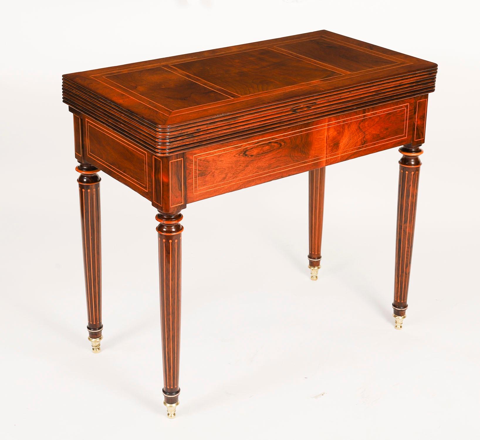 This is a fabulous and rare high quality antique Charles X Gonçalo Alves and inlaid metamorphic games table for cards and roulette, circa 1810 in date.

The hinged inlaid top opens firstly to reveal the green baize lined gaming interior for playing