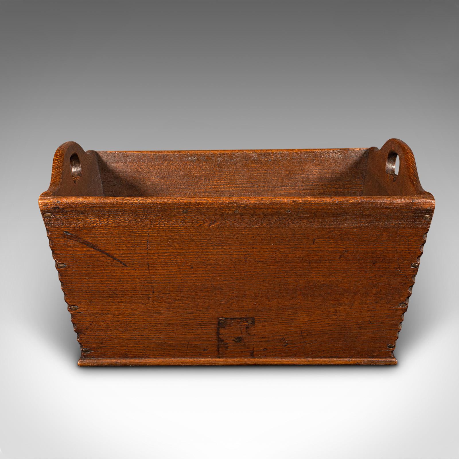 This is an antique cheese carrying box. An English, oak garden produce tray or work box, dating to the Georgian period, circa 1800.

Generously sized box, ideal for carrying large truckles of cheese or garden produce
Displays a desirable aged