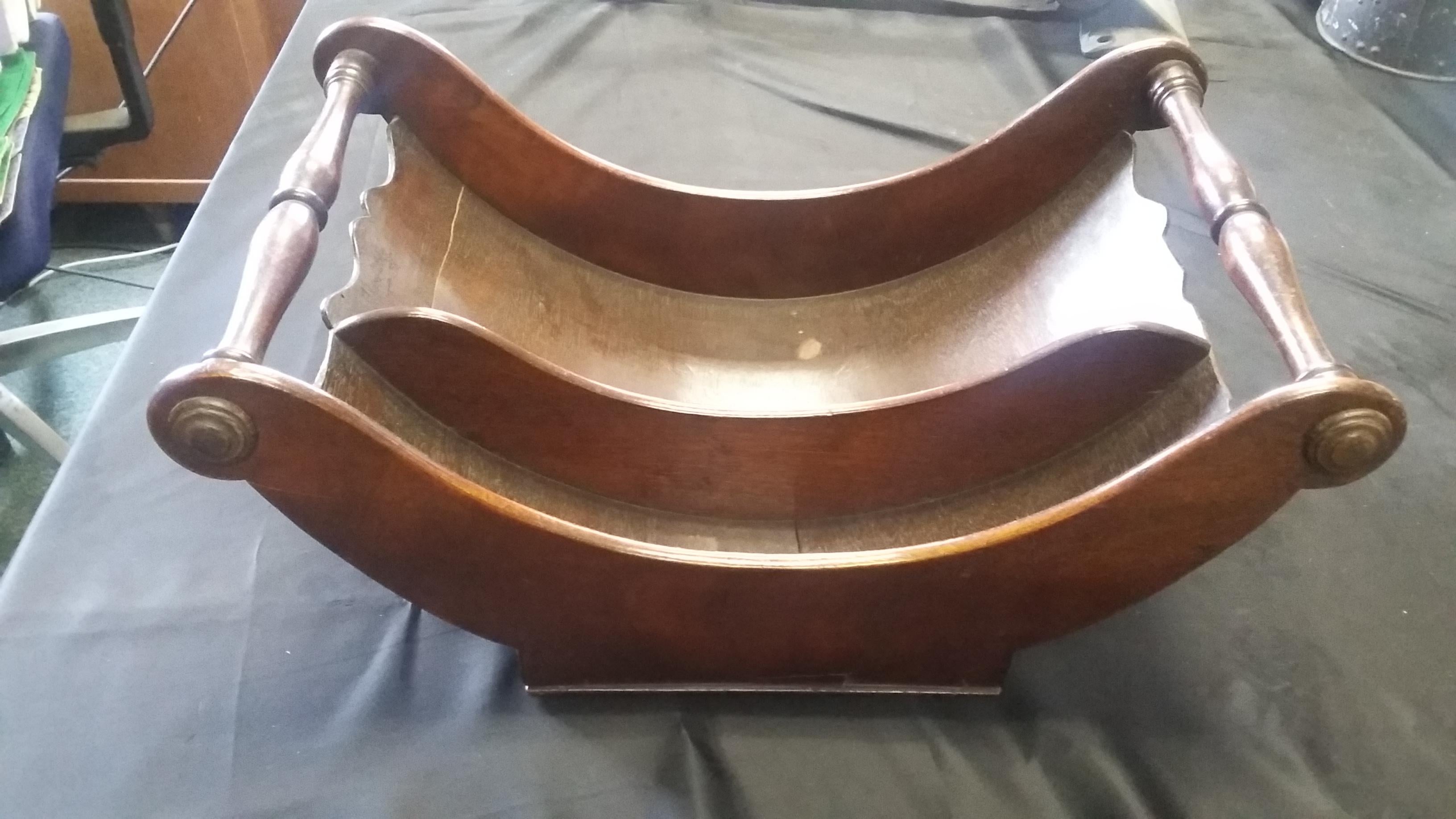 Antique mahogany serving piece. Referred to as a cheese coaster. Made in England perhaps early to mid-18th century. Has 2 visible cracks but is still intact. Designed with 