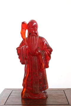 Antique Cherry Amber Resin Confucius Sculpture