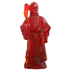 Antique Cherry Amber Resin Confucius Sculpture