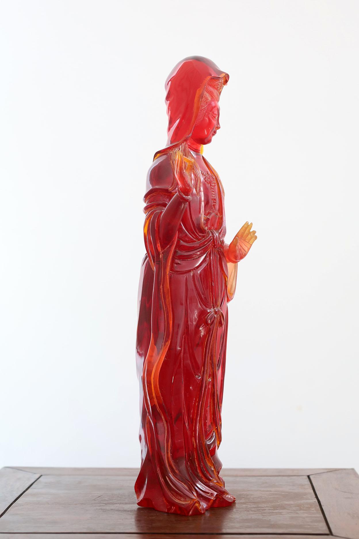 Chinese Export Antique Cherry Amber Resin Guanyin Sculpture For Sale