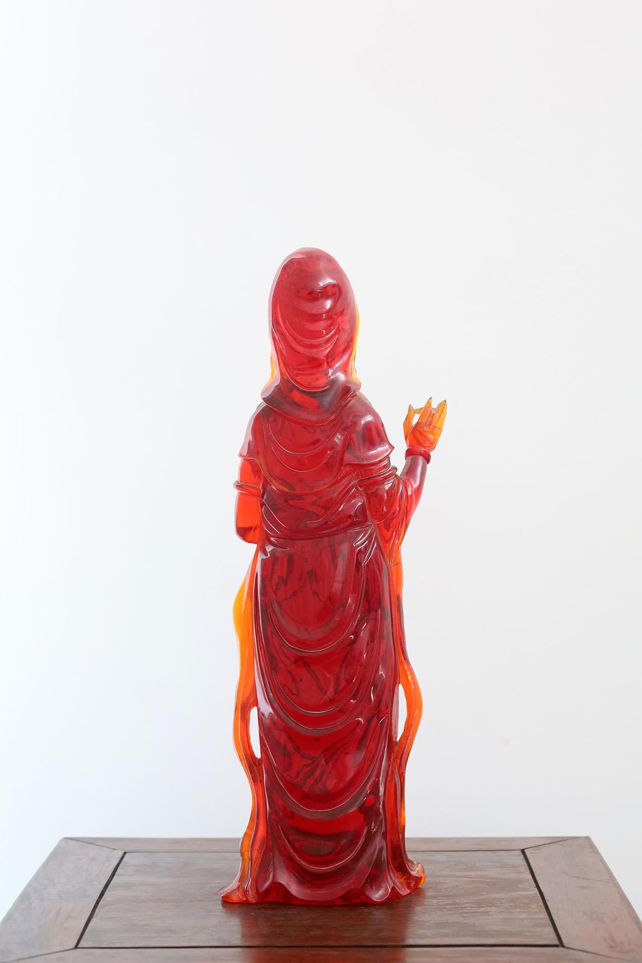 Hand-Carved Antique Cherry Amber Resin Guanyin Sculpture For Sale
