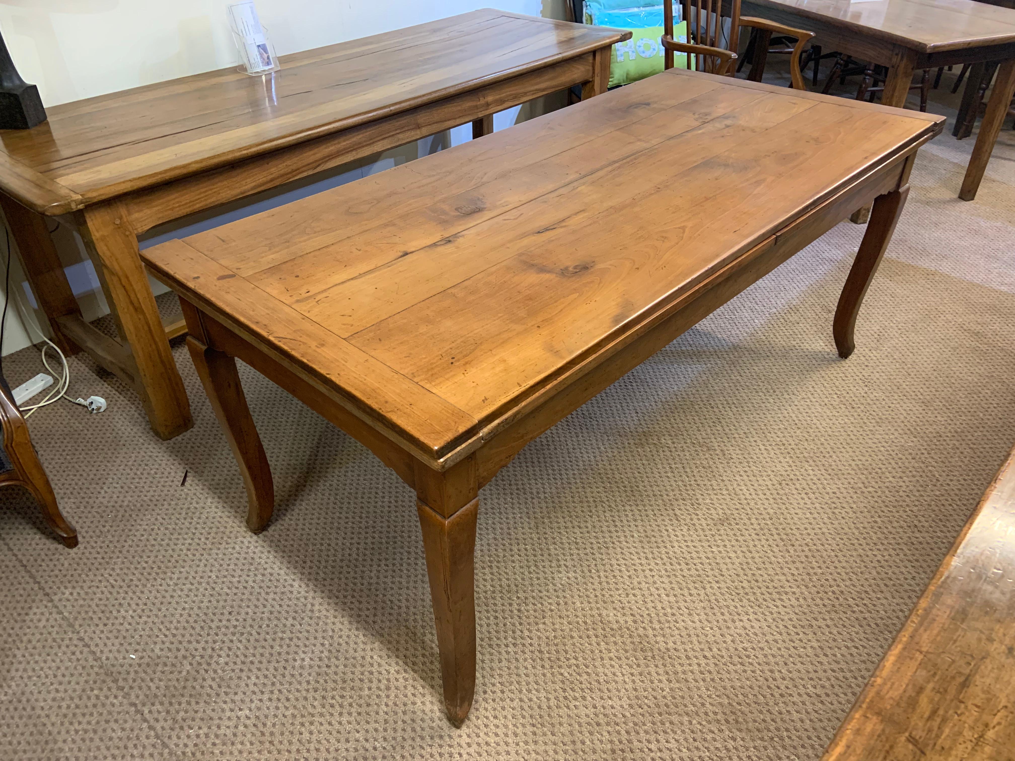 Antique Cherry Double Draw leaf table with cabriole legs. This French extending cherrywood farmhouse table Circa 1880 has original base and stands on beautiful cabriole legs. The extension are solid and can be drawn at various lengths. The length