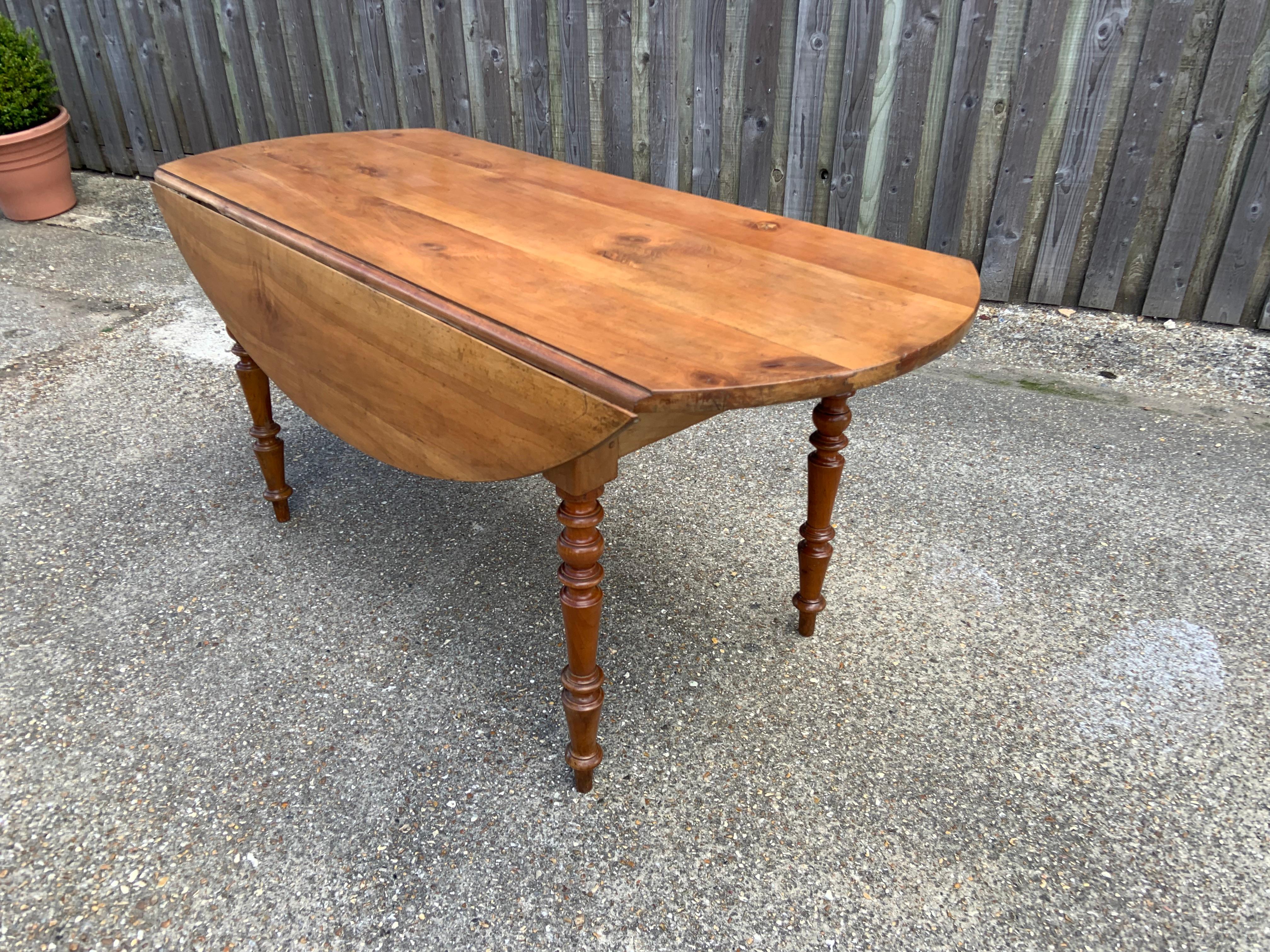 antique cherry drop leaf table