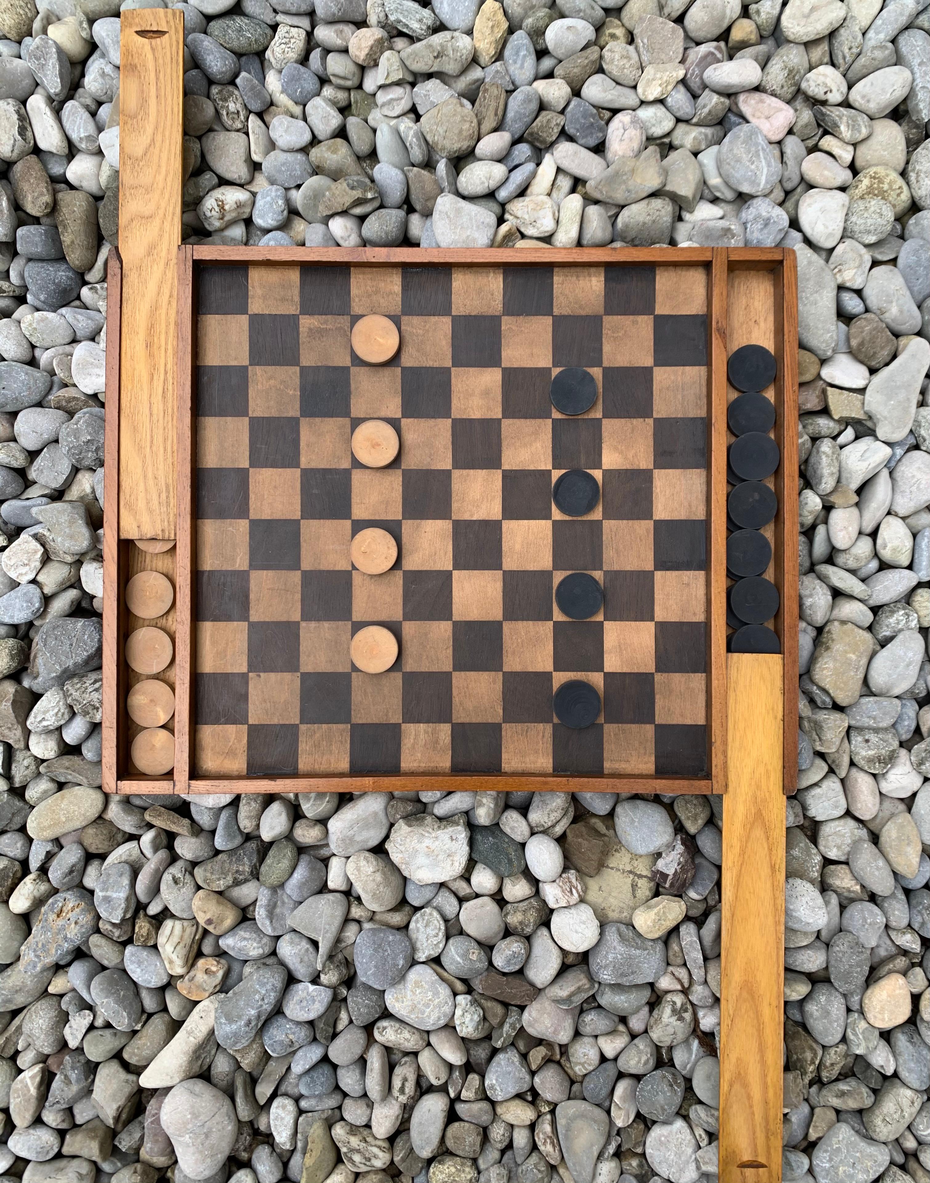 Fine double sided game board made out of oak with chequers.