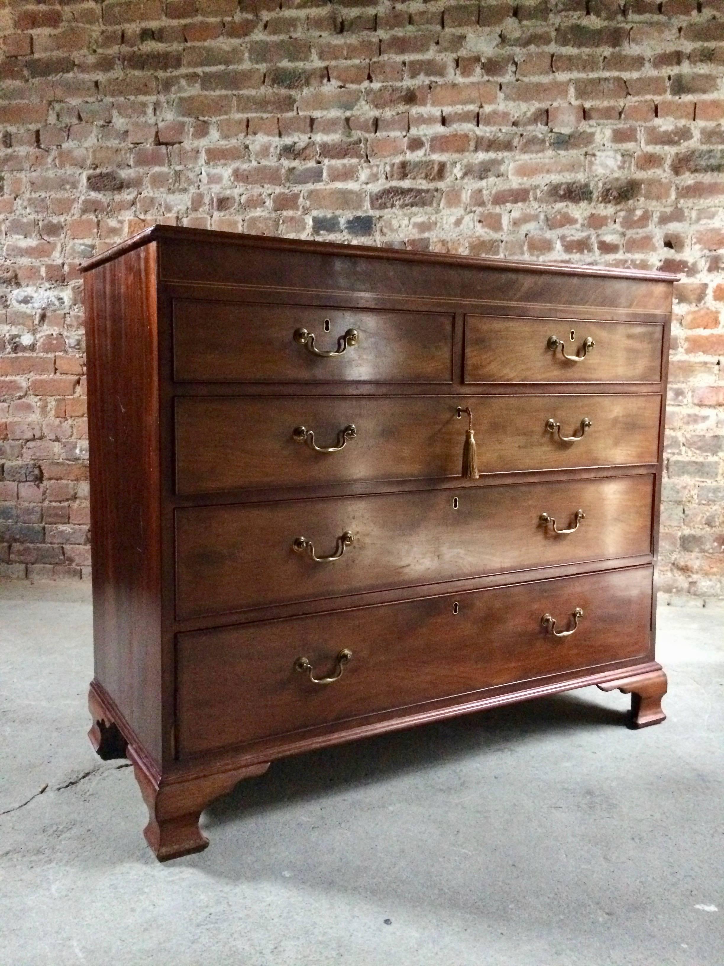 Antique 19th century mahogany chest of drawers circa 1875, the rectangular top over two short and three long drawers all with brass drop handles raised on ogee bracket feet, comes with one non working key with tassel.


Antique

Victorian