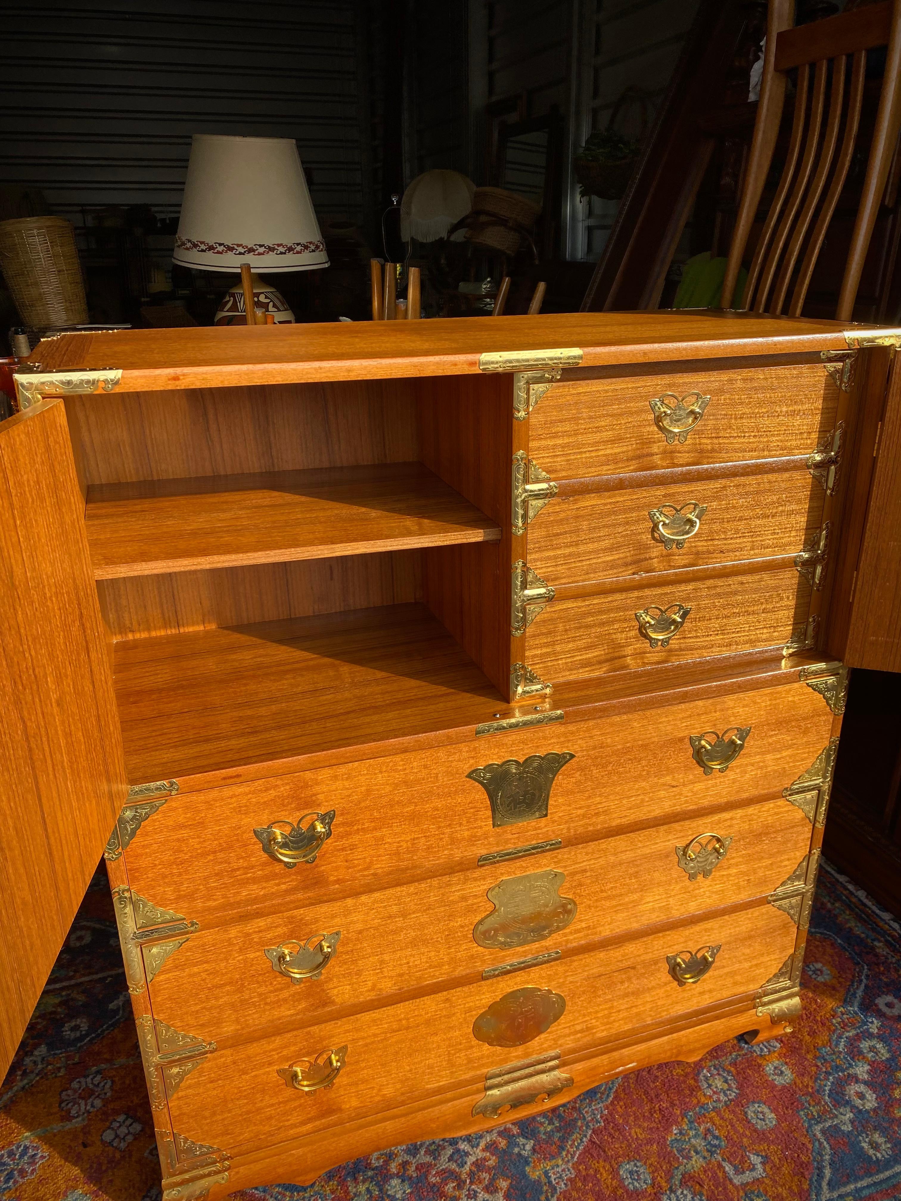 Gorgeous dresser piece, circa 1900s. Beautiful gold pulls accent the sleek modern design. Tons of storage space. Such a coveted piece. 