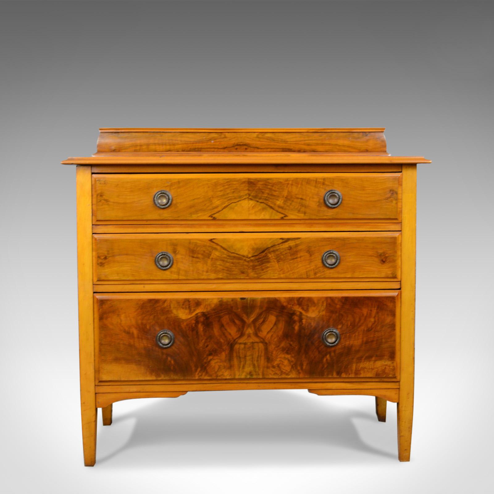 This is an antique chest of drawers in satin figured walnut. An English, Victorian piece dating to circa 1900.

Attractive shimmer to the well figured satin walnut
Good color throughout with a desirable aged patina
Configured as three straight