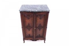 Antique chest of drawers with stone top, France, late 19th century.