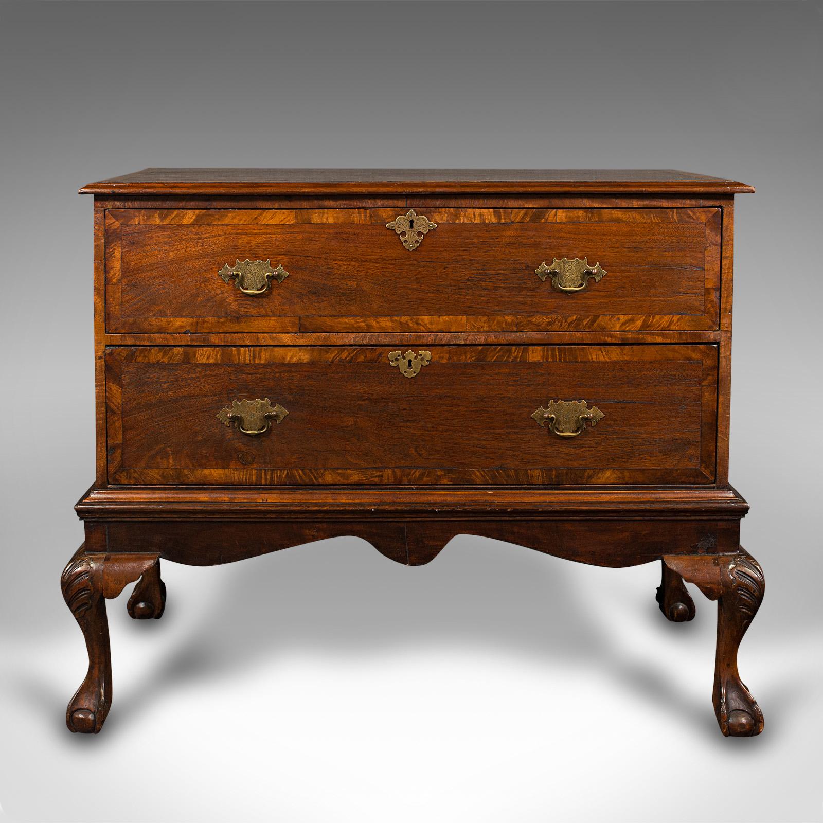 This is an antique chest on stand. An English, flame mahogany lowboy chest of drawers, dating to the Victorian period, circa 1870. 

Elegant chest of drawers with superb figuring and colour.
Displays a desirable aged patina and in good