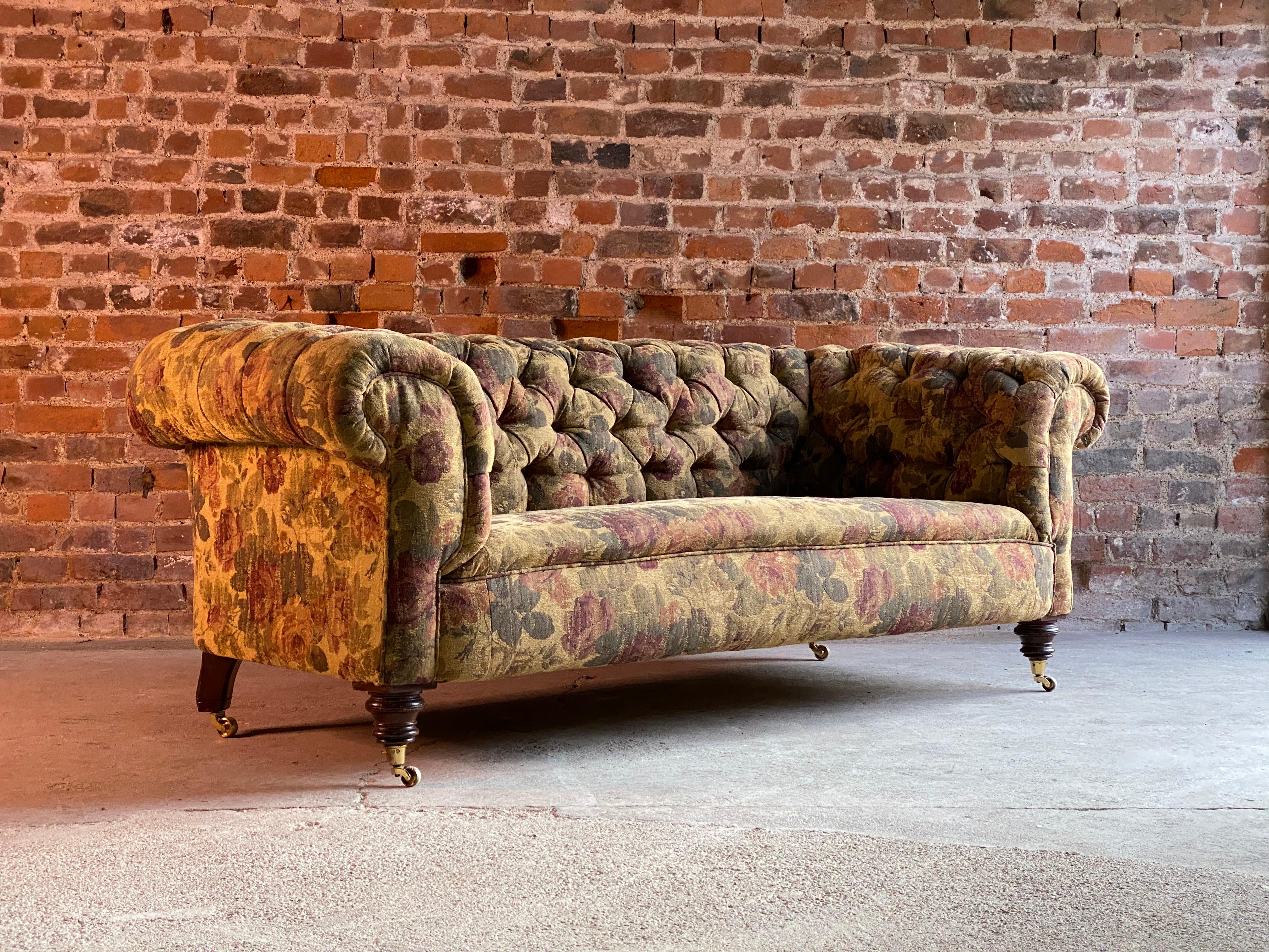 Antique chesterfield sofa settee button-back three-seat Victorian, circa 1890

Fabulous 19th century Victorian chesterfield button-back three seat sofa circa 1890, the sofa has mahogany turned legs to the front and splayed legs at the rear and