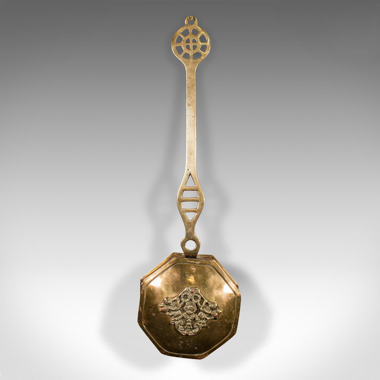 This is an antique chestnut warmer. An English, brass hanging roaster, dating to the Georgian period, circa 1800.

Fascinating Georgian warmer with an appealing decorative motif
Displays a desirable aged patina and in good original order
Brass