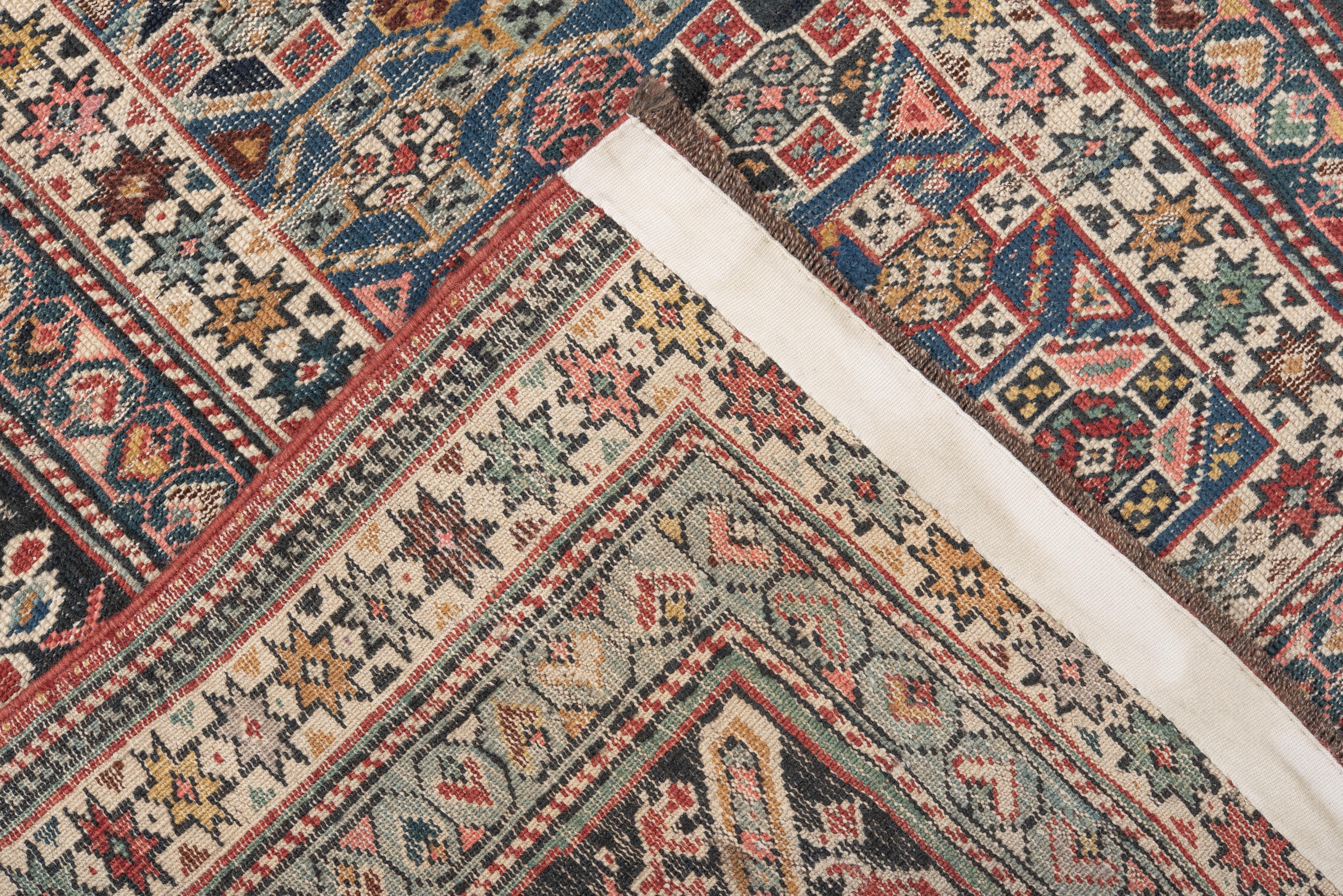 20th Century Antique Chichi Caucasian Rug with Pinks and Blue and Purple and Reds in Floral For Sale
