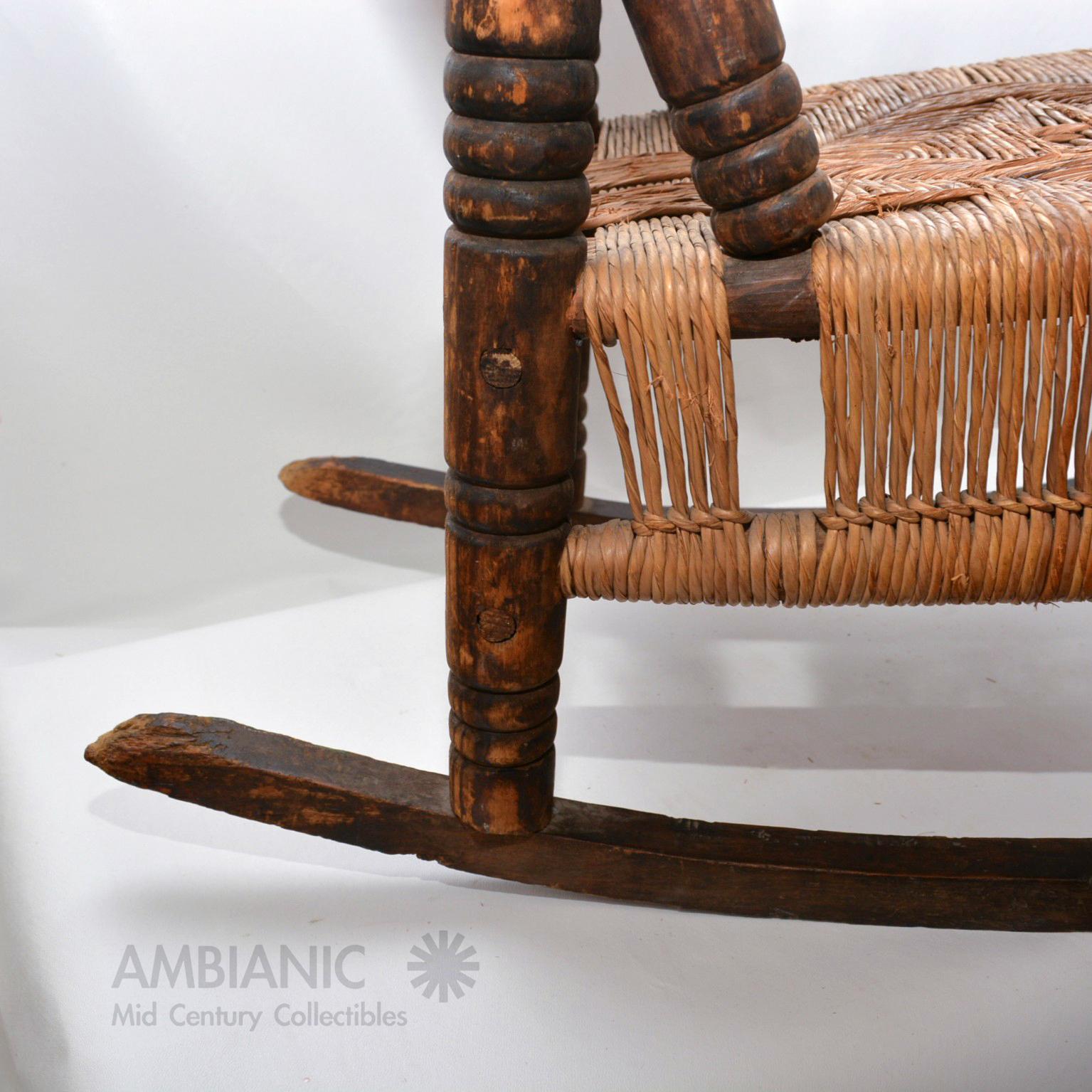 Antique Children's Rocking Chair Wood and Wicker Seagrass Armchair Rocker, 1930s In Fair Condition In Chula Vista, CA