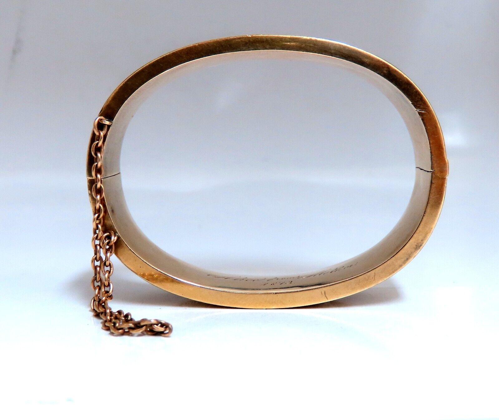 Antique Child's Bangle Bracelet

Intricate Engraving Details

Durable, Well Made

14kt. yellow gold

25.2 Grams.

Should fit 5 inch wrist, please see measurements of inner:

1.5 x 2 inches

16mm wide bangle