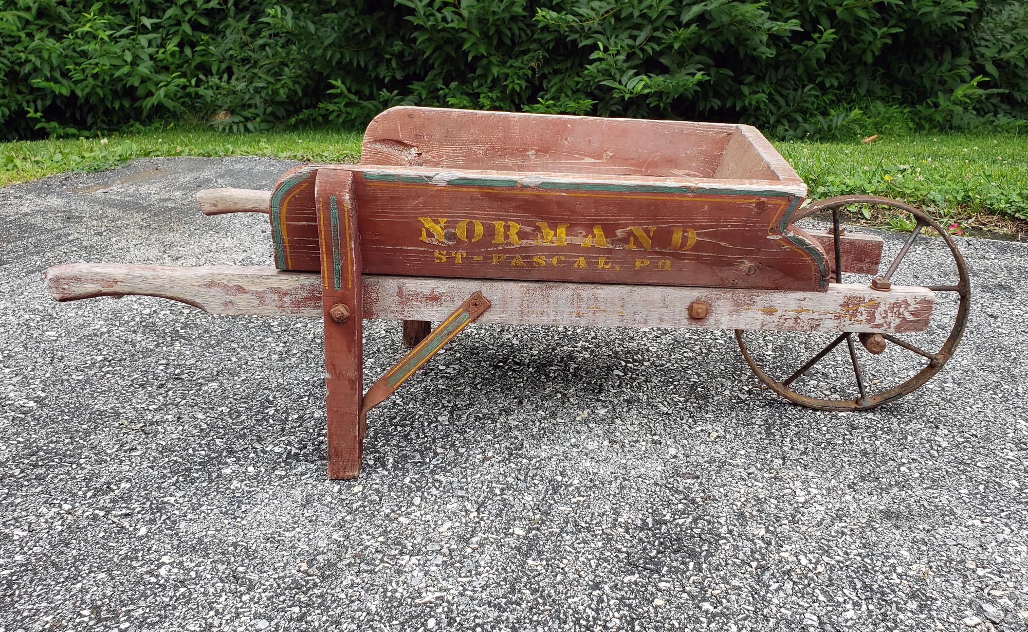 antique wooden wheelbarrow