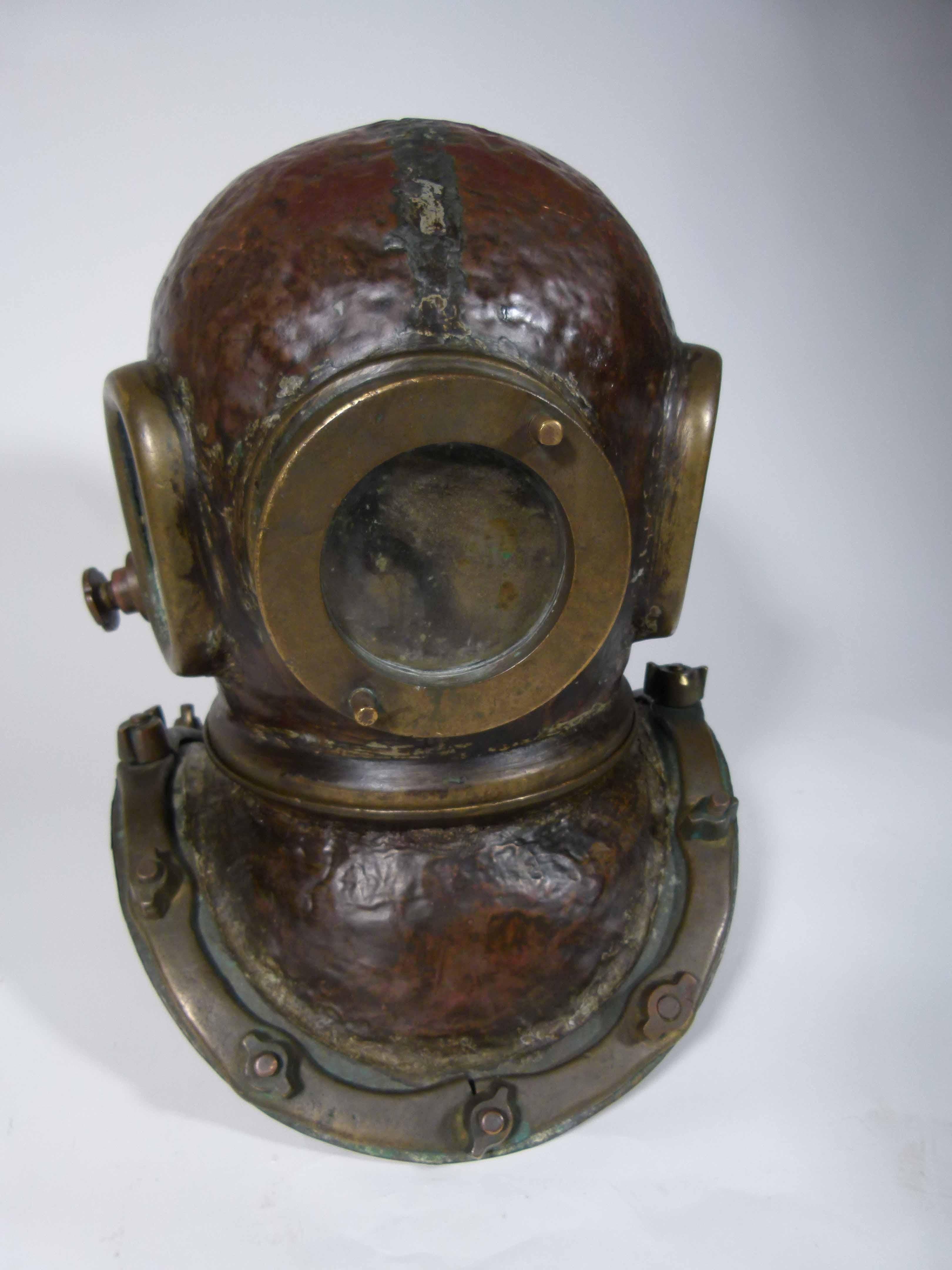 Antique (circa 1920) Chilean diving helmet with all glass intact in all 3 ports. Perfect to add to your nautical collection.