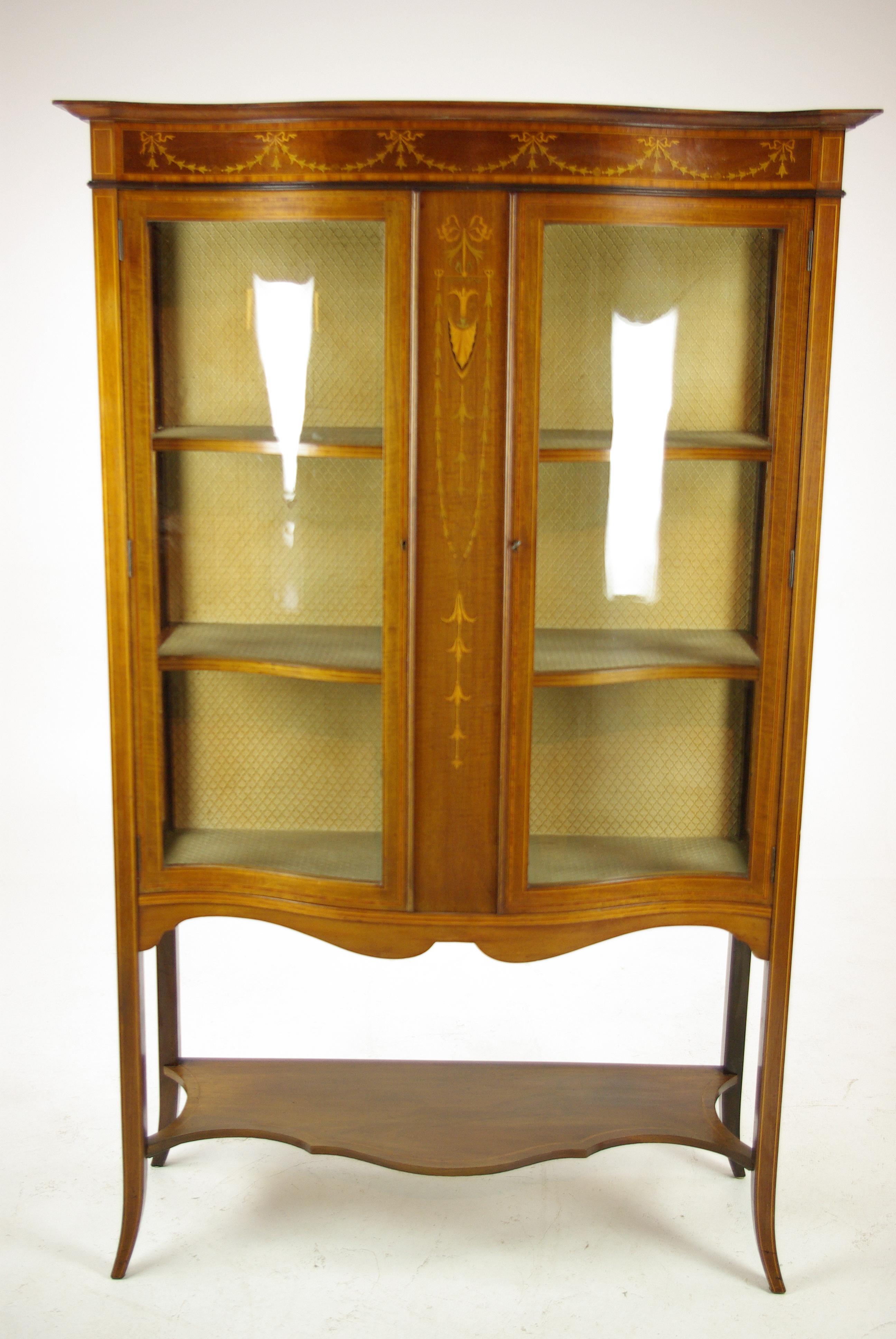Antique China cabinet, walnut, bow front cabinet, Curio cabinet, Scotland 1910, Antique Furniture, B1276

Scotland, 1910
Solid walnut with satinwood veneers
Original finish
Serpentine Top
Inlaid frieze below
Central inlaid panel in