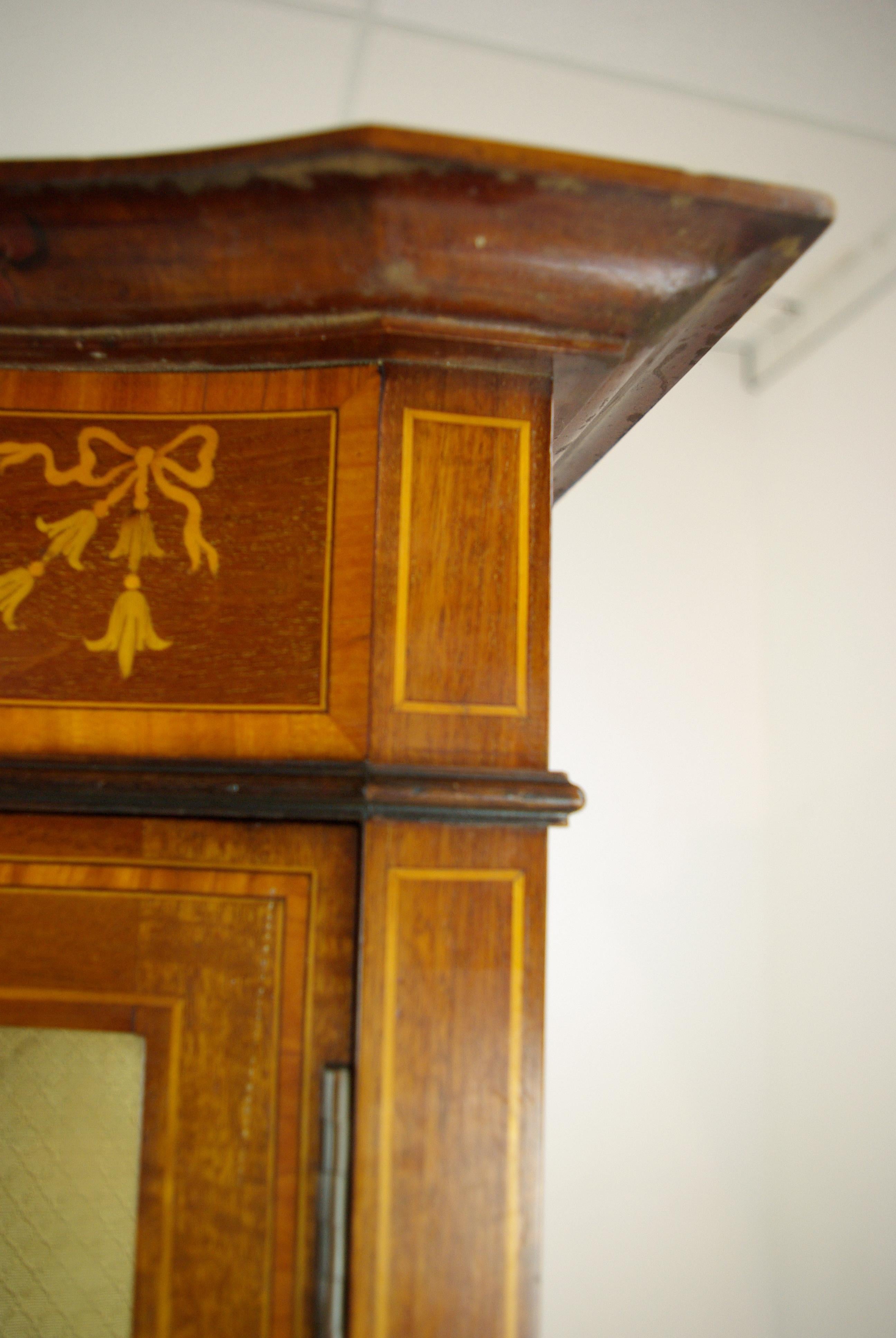 bow front curio cabinet