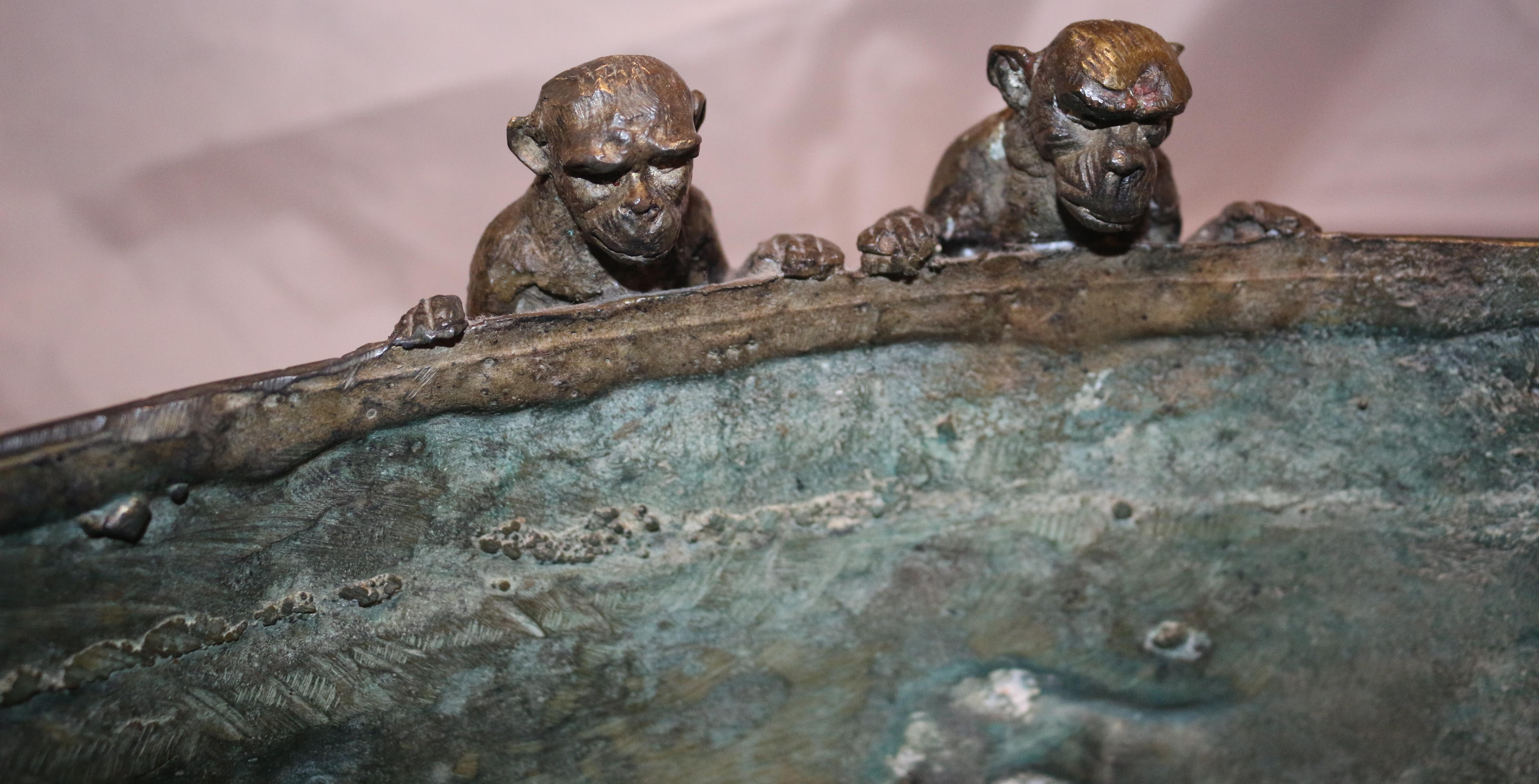 Antique Chines extra large bronze payer bowl Jardinière with 9 monkeys crawling up.
Attractive pettina inside.