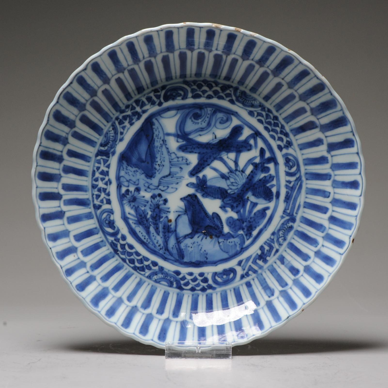 Description

A very nicely decorated plate with a Frog on on a rock in a landscape scene. Wanli, Tianqi or Chongzhen Period 1590 – 1640

With a nice moulded double chrysanthemum petal rim.

Similar piece pictured in:
Ko-Sometsuke (two volume