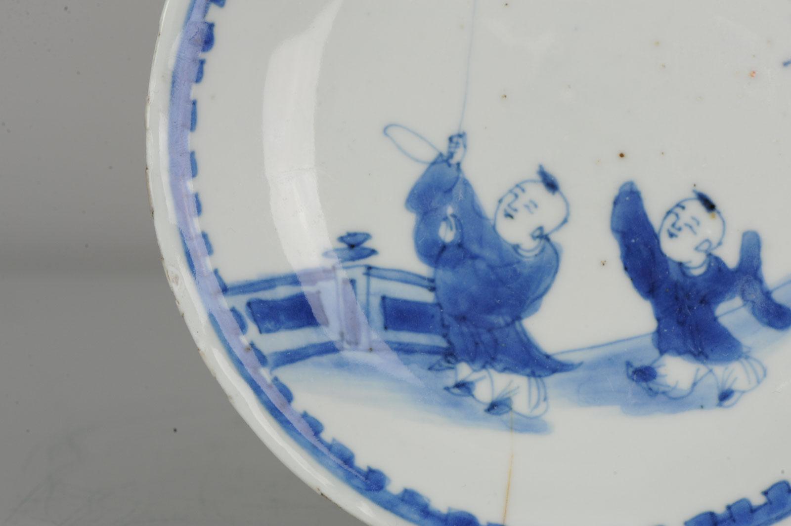 Antique assiette chinoise du 17ème siècle en porcelaine Ming/Transitionnelle Garçons avec oiseau en vente 2