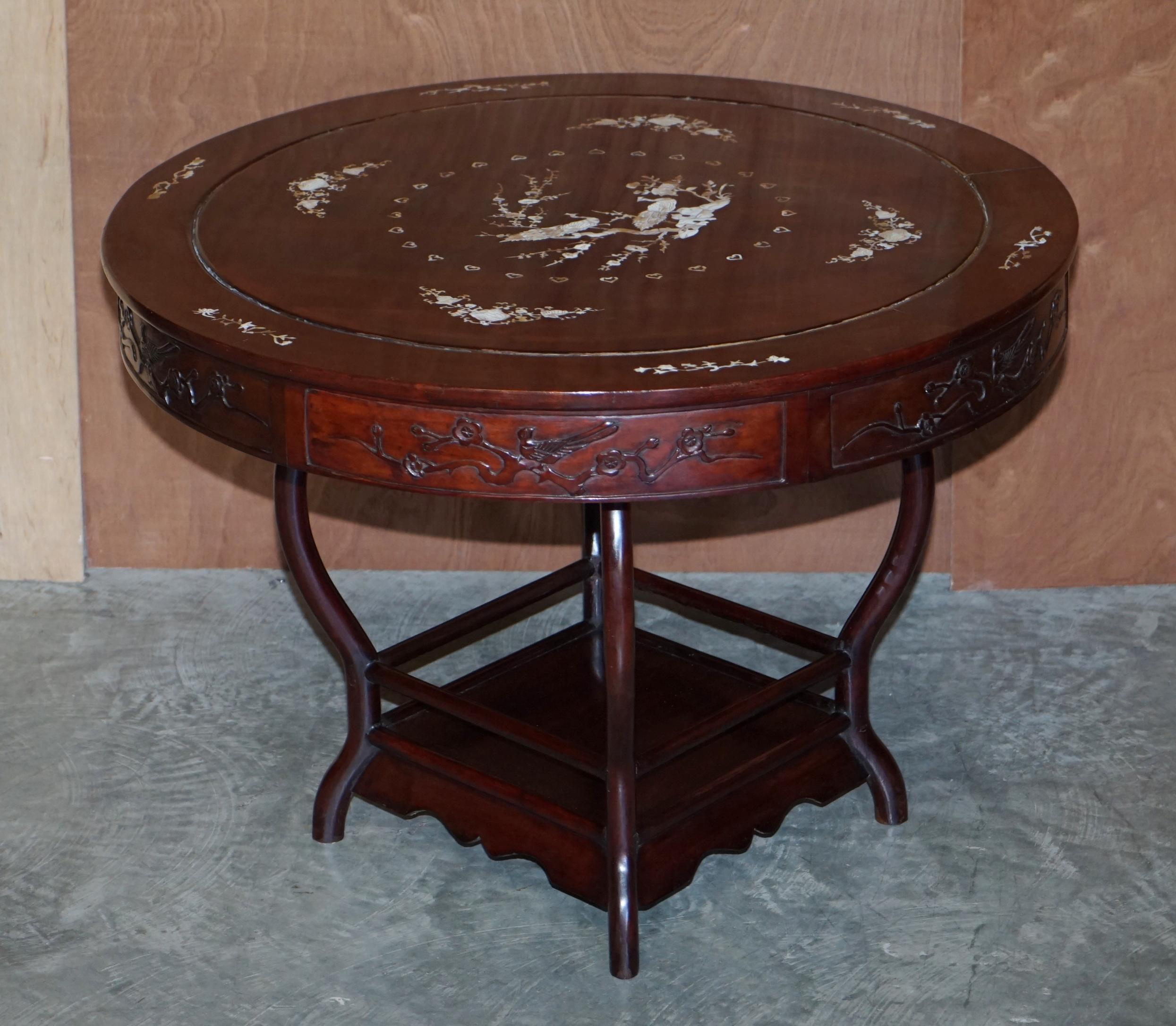 A very good looking and well made suite, the table is rosewood with mother of pearl inlay, the central section has peacocks which symbolised dignity and beauty and was favoured throughout the Republic period. The peacocks are surrounded by hearts