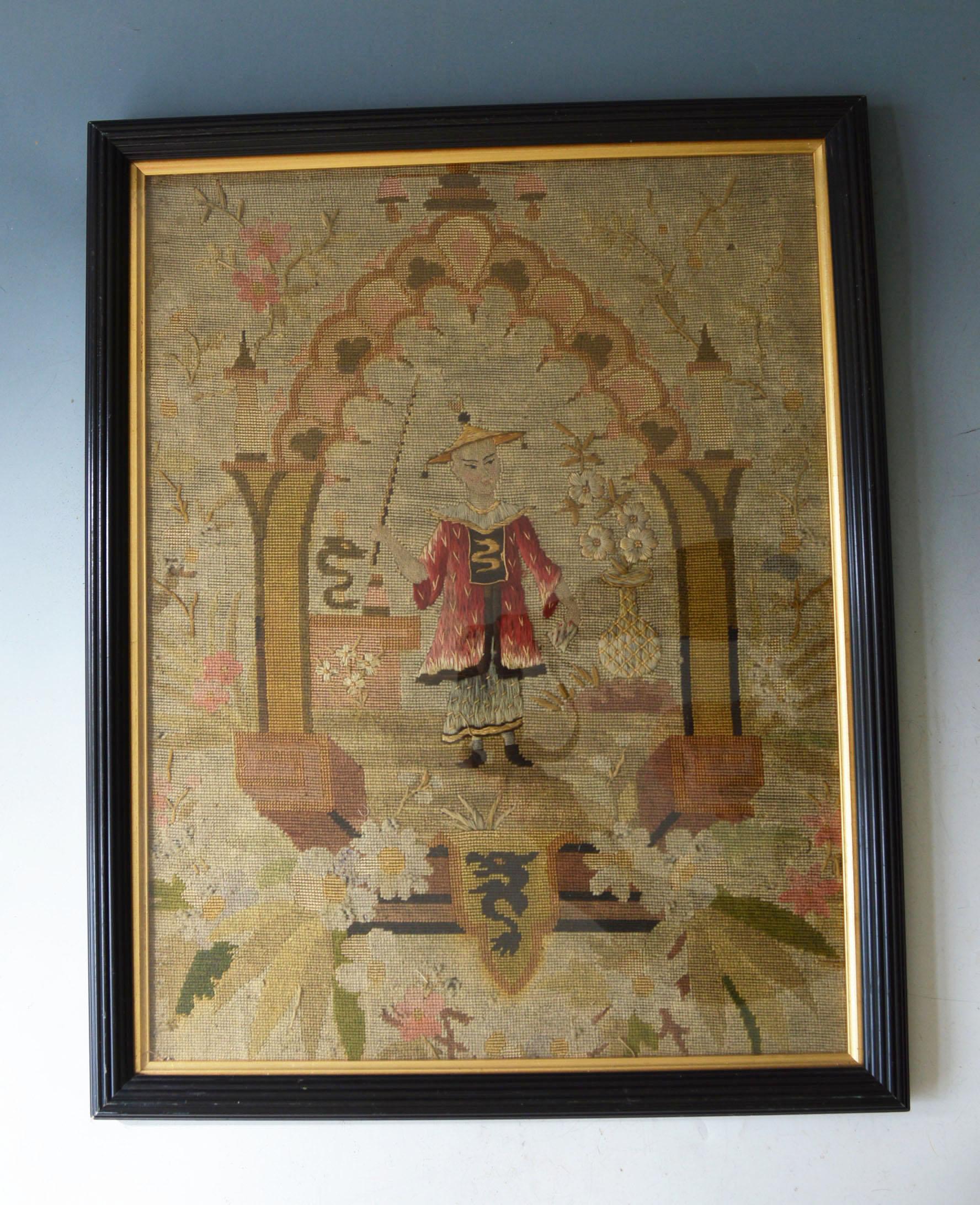 Antique Chinese  wool and Silk work tapestry panel  
A 19th century wool and silk work tapestry panel depicting a Chinese man standing under an arch,
 Framed & glazed, 
Size 42 by 54 cm.
 