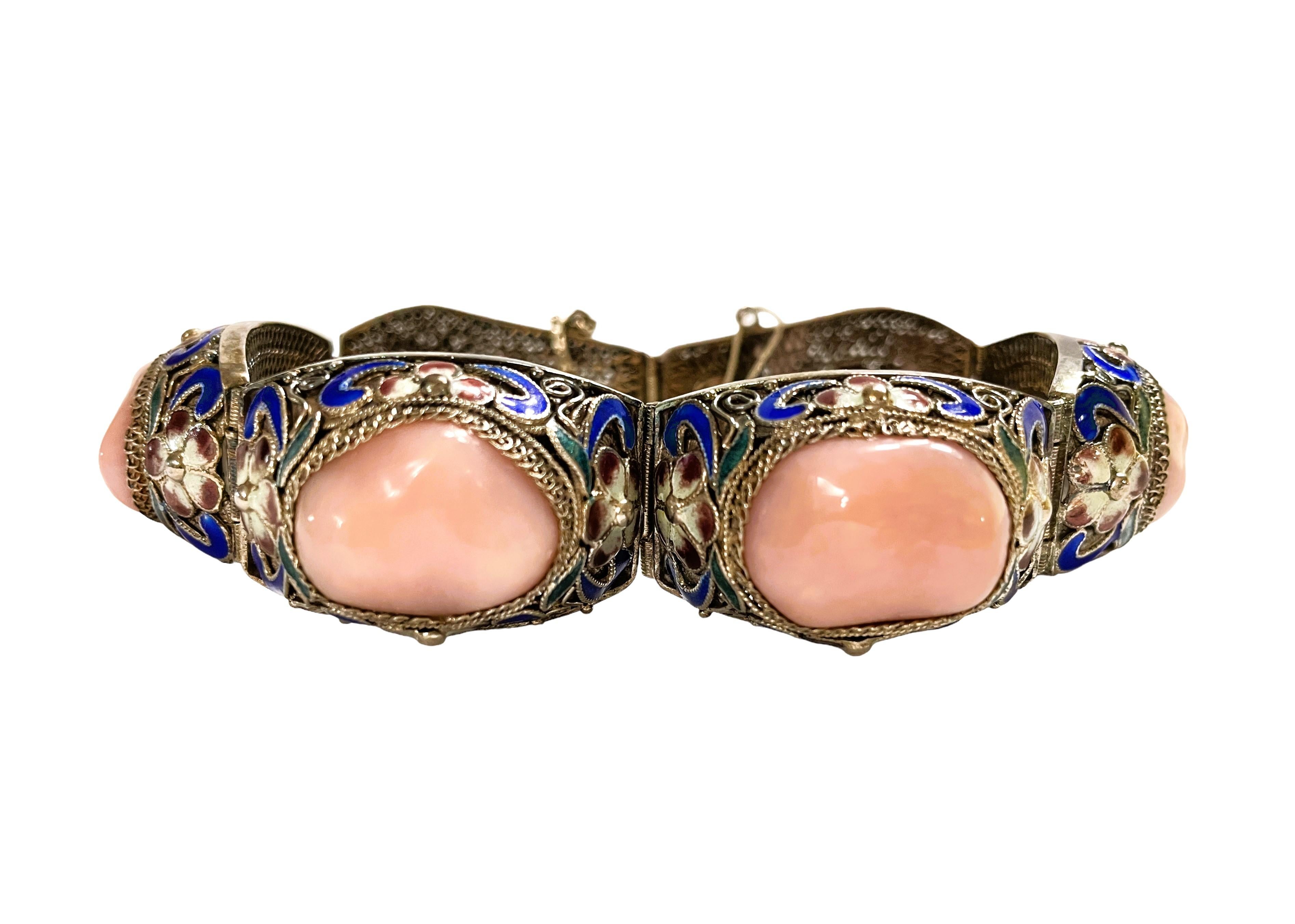 This is a gorgeous handmade bracelet.   It is Pre-Owned but in excellent condition.  It is a nice and heavy, well-made bracelet weighing 55.84 grams.   It is stamped 925 near the clasp.  It is an Antique Chinese filigree silver bracelet comprising